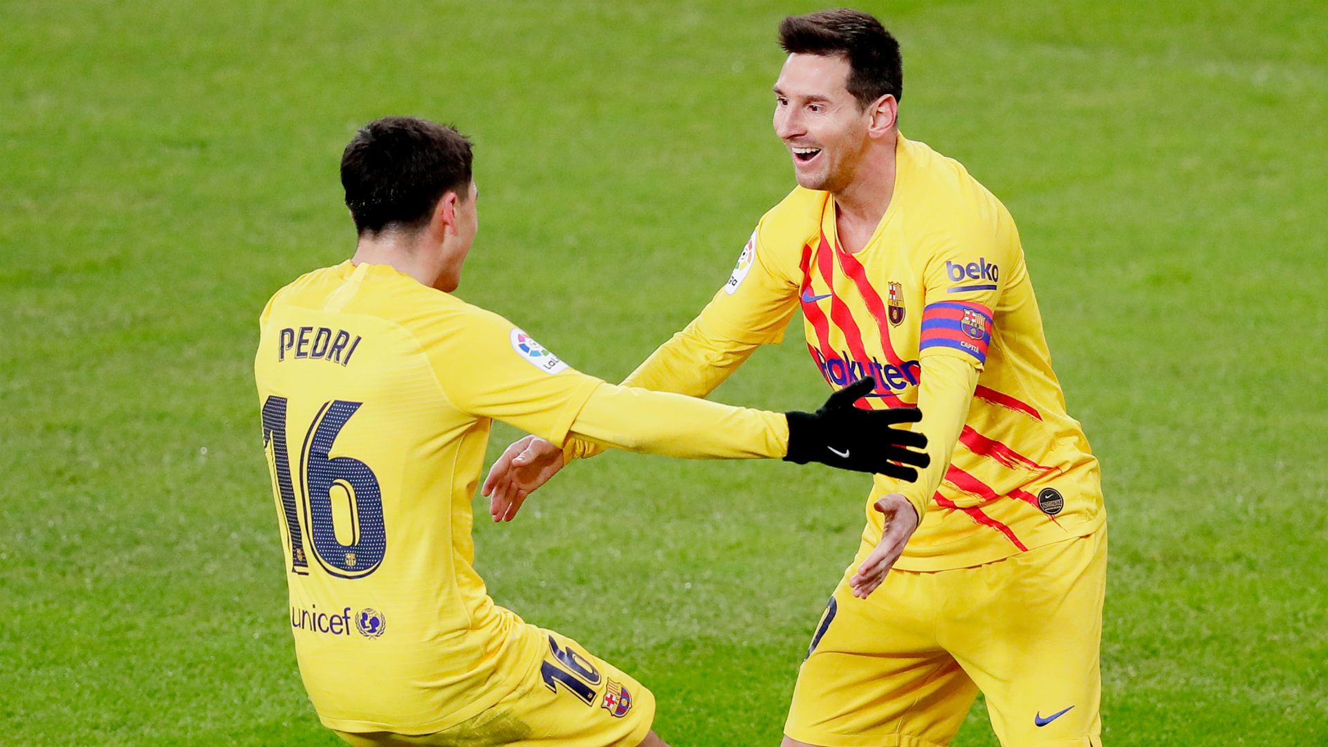 Pedri and Messi celebrate