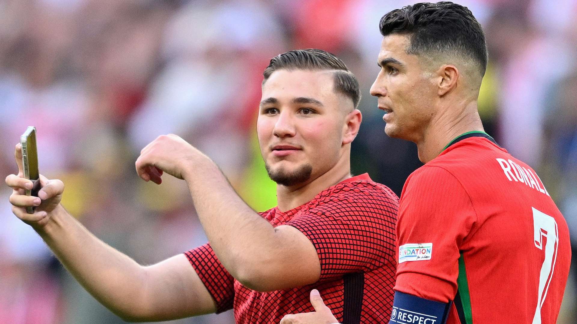 Cristiano Ronaldo pitch invader Euro 2024