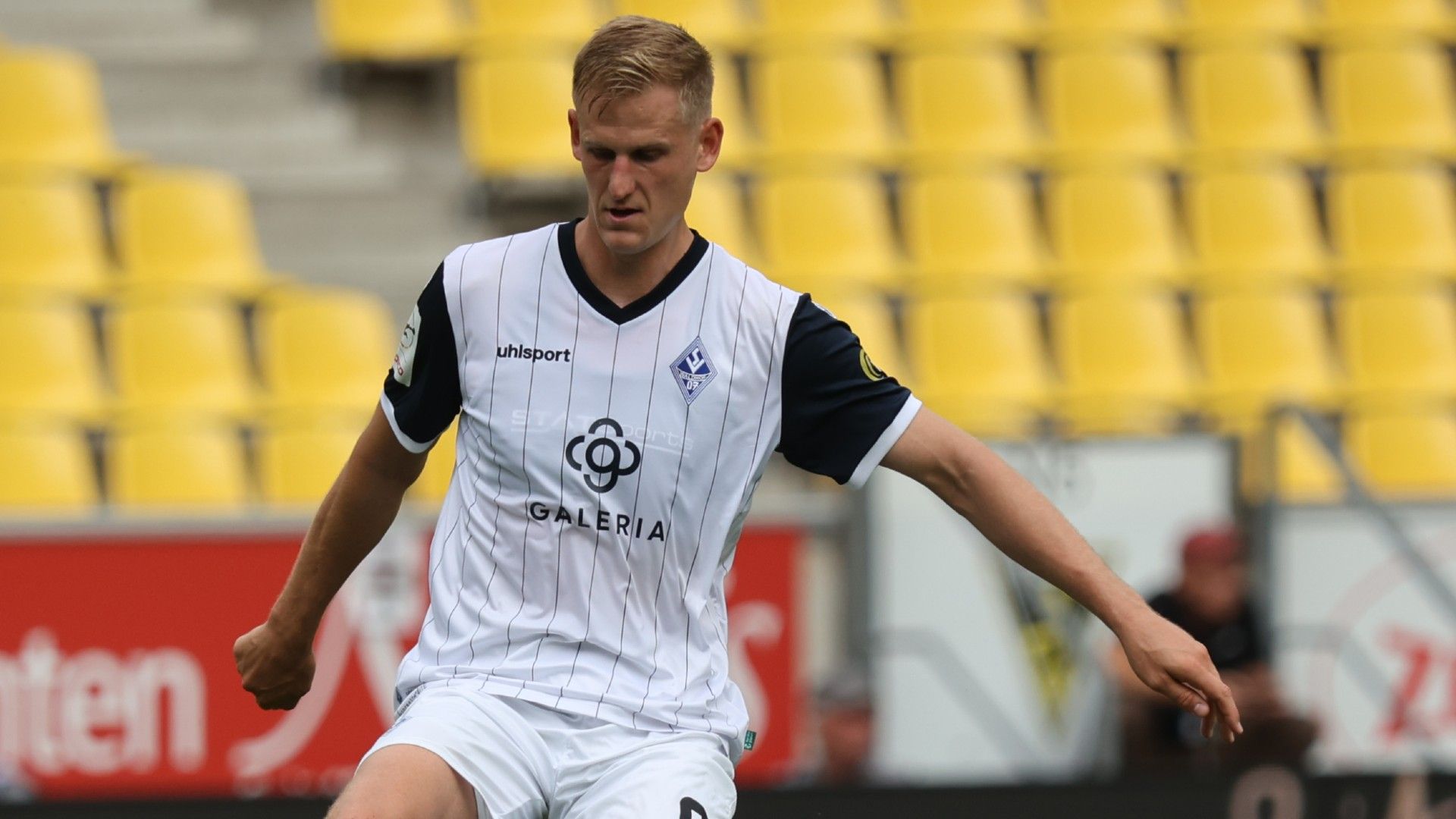 Niklas Hoffmann of Mannheim controls the ball