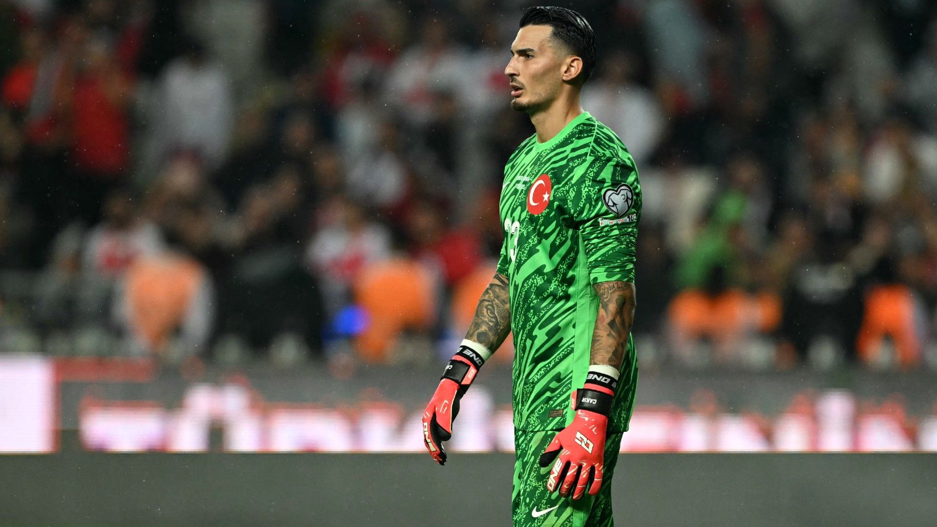 Turkey's goalkeeper #23 Ugurcan Cakir looks on