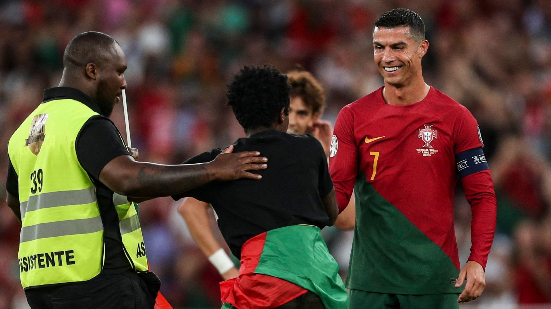 Cristiano Ronaldo handshake pitch invader Portugal Bosnia-Herzegovina 2023