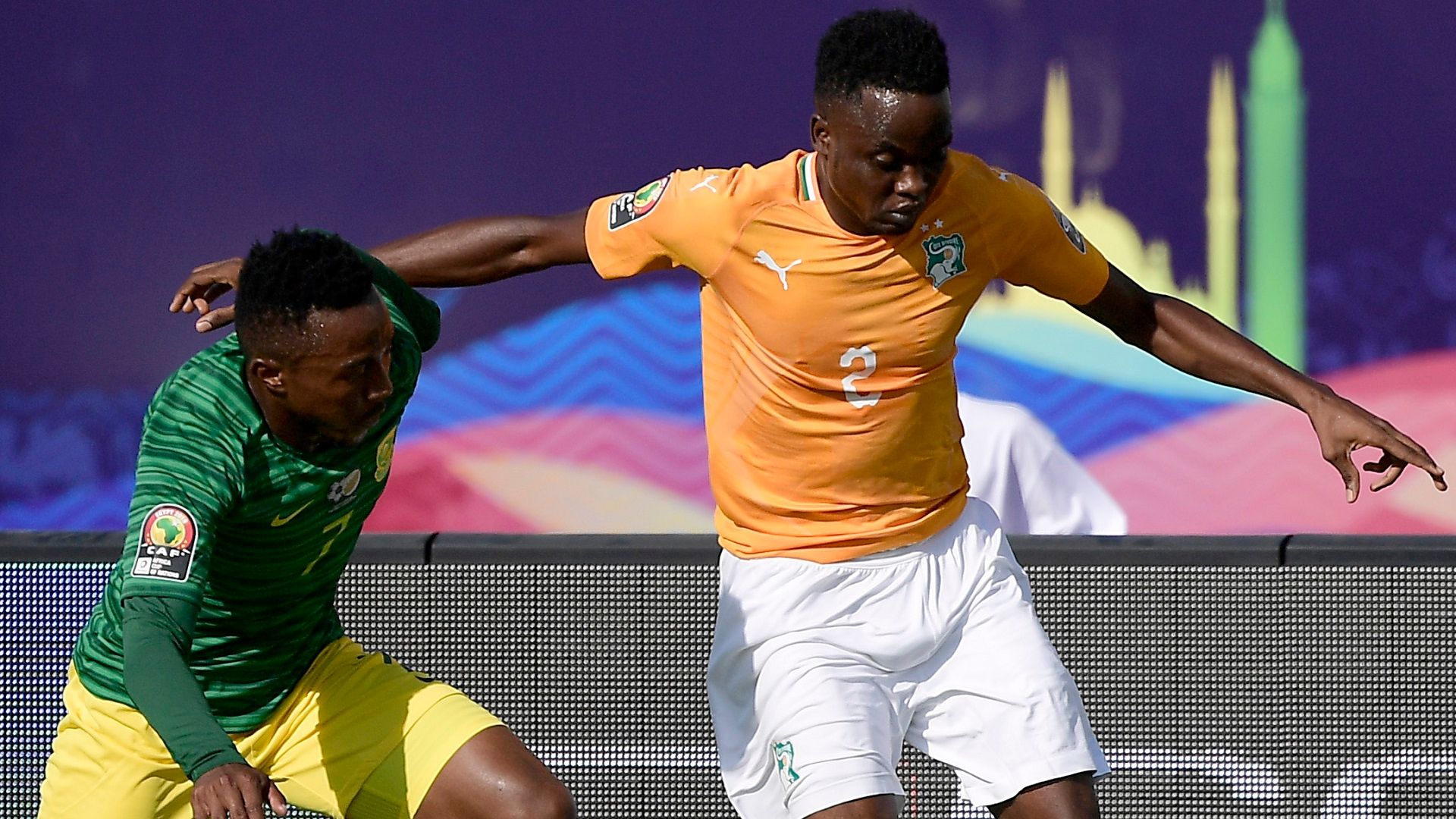 South Africa's forward Lebogang Maboe (L) fights for the ball with Ivory Coast's defender Wonlo Coulibaly during the 2019 Africa Cup of Nations