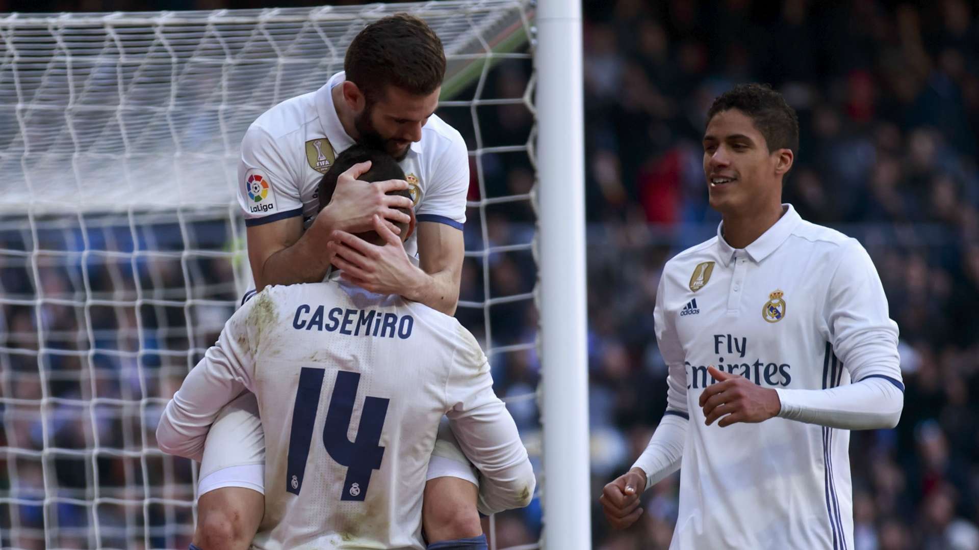 Casemiro, Nacho Fernández and Raphael Varane, celebrating a goal for Real Madrid