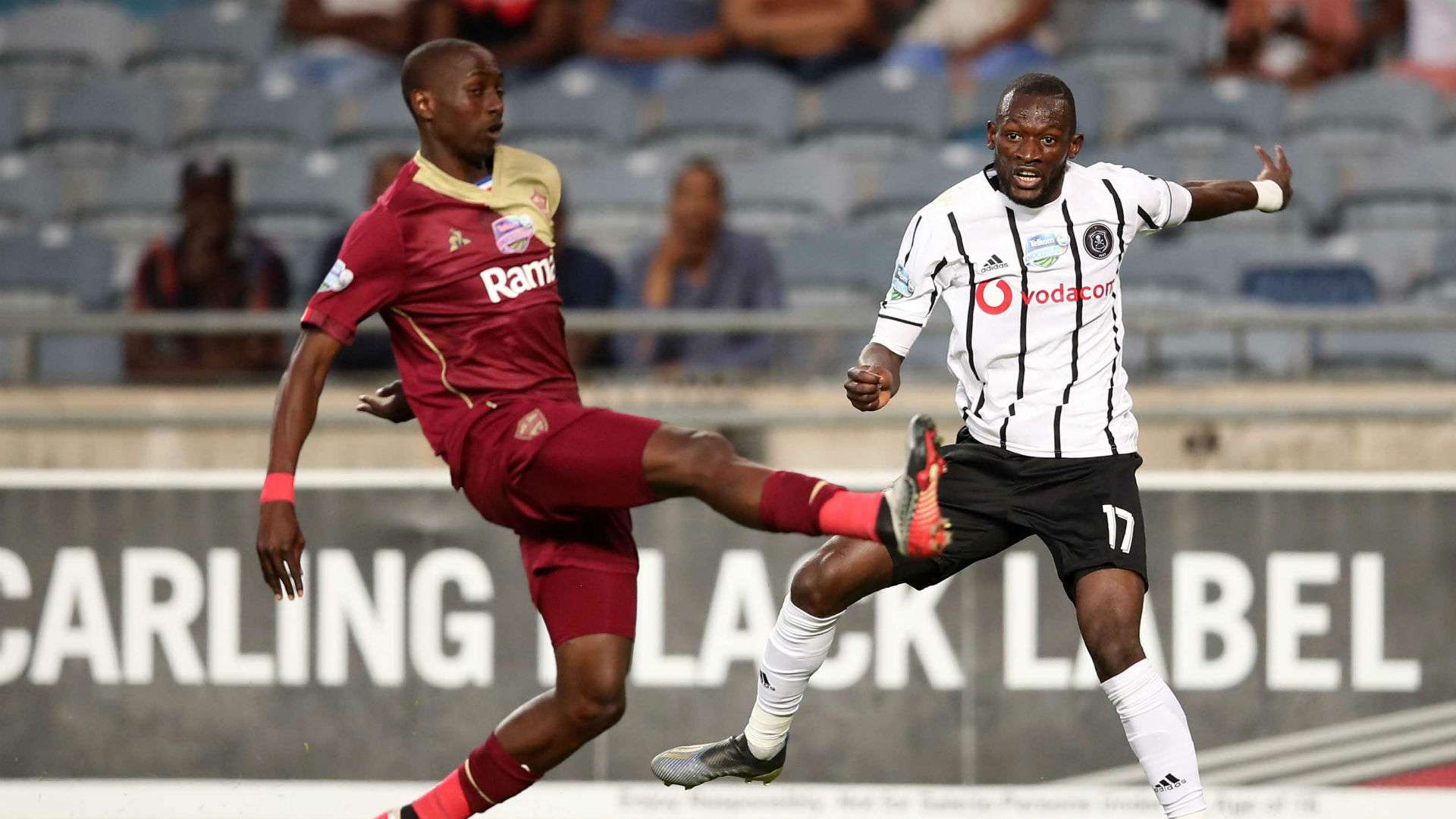 Augustine Mulenga of Orlando Pirates challenged by Nyiko Mabbie of Stellenbosch FC, October2019