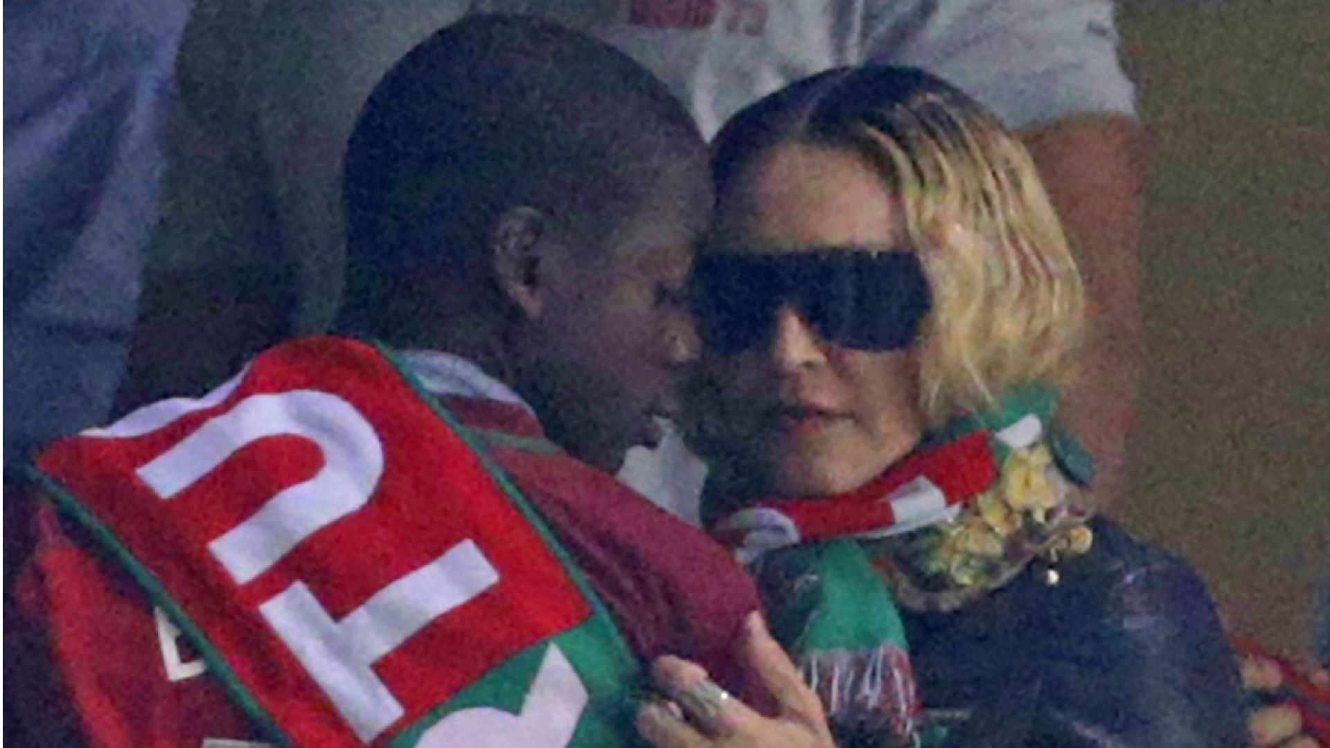 Madonna and his son in a football game