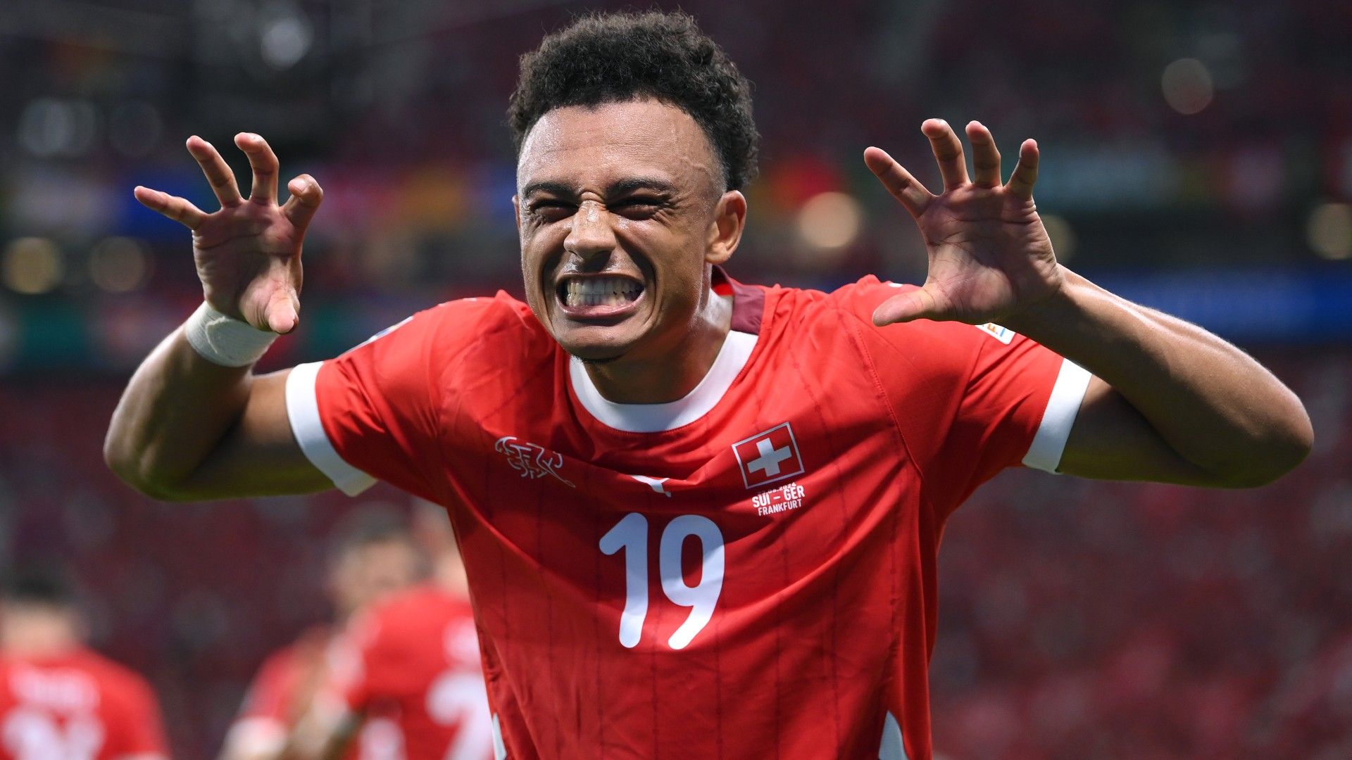 Dan Ndoye of Switzerland celebrates