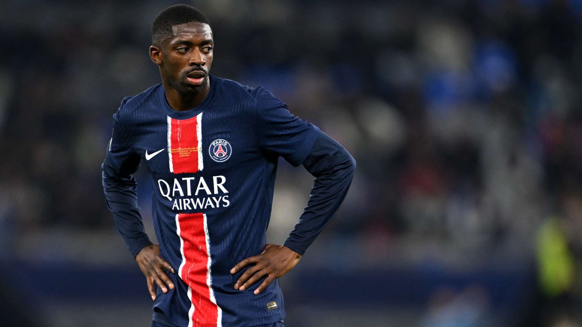 Paris Saint-Germain's French forward #10 Ousmane Dembele reacts