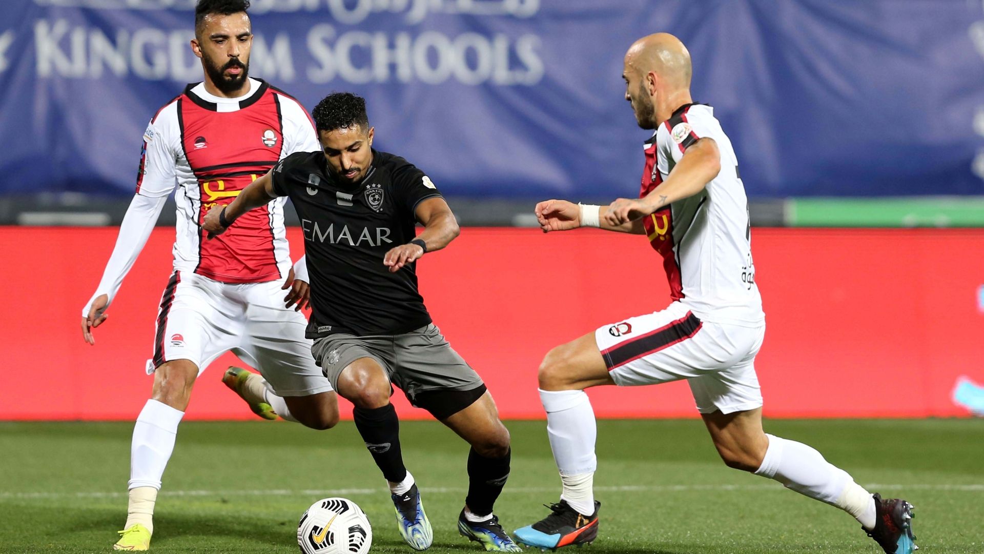 Salem Al Dawsari (2-L) Nemanja Miletic (R) Al Hilal Al Raed SPL 05 March 2021