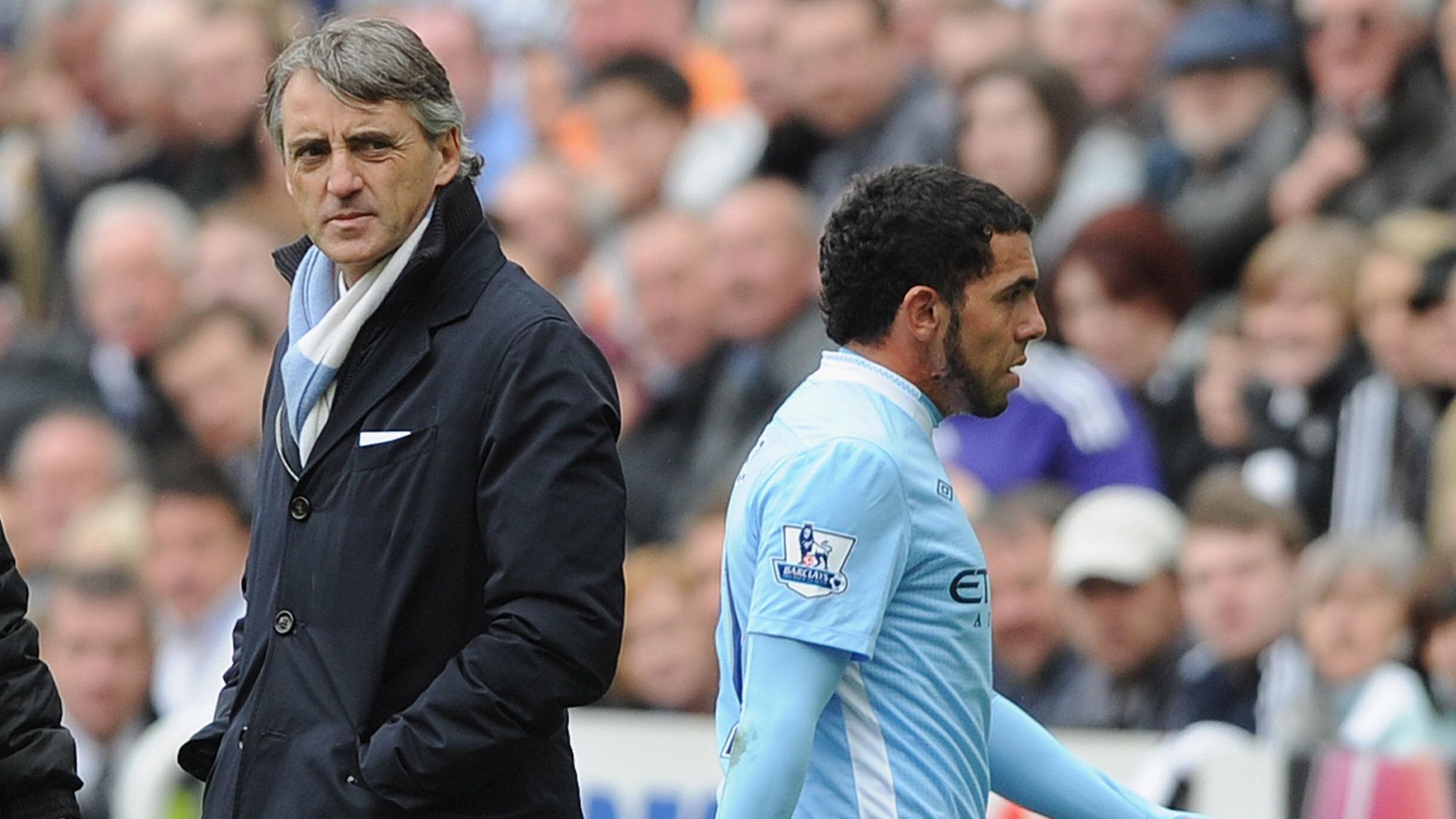 Roberto Mancini and Carlos Tevez