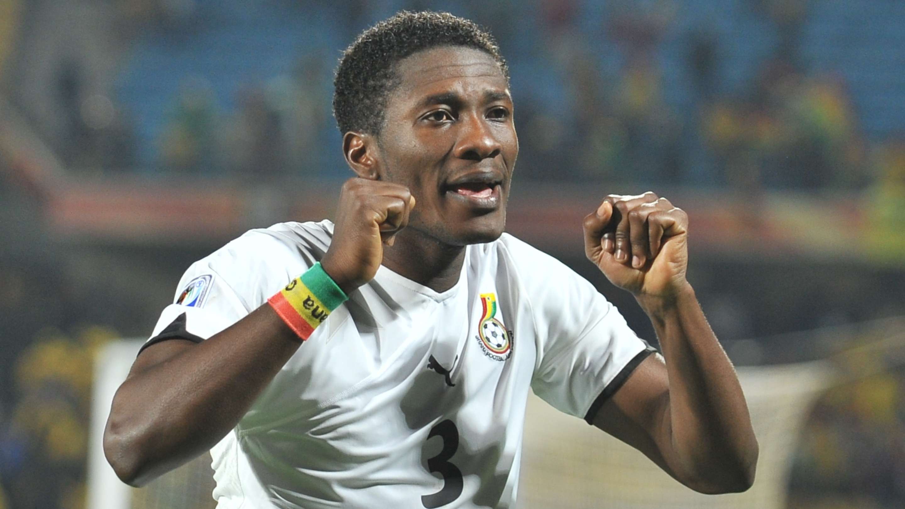 Ghana's striker Asamoah Gyan celebrates