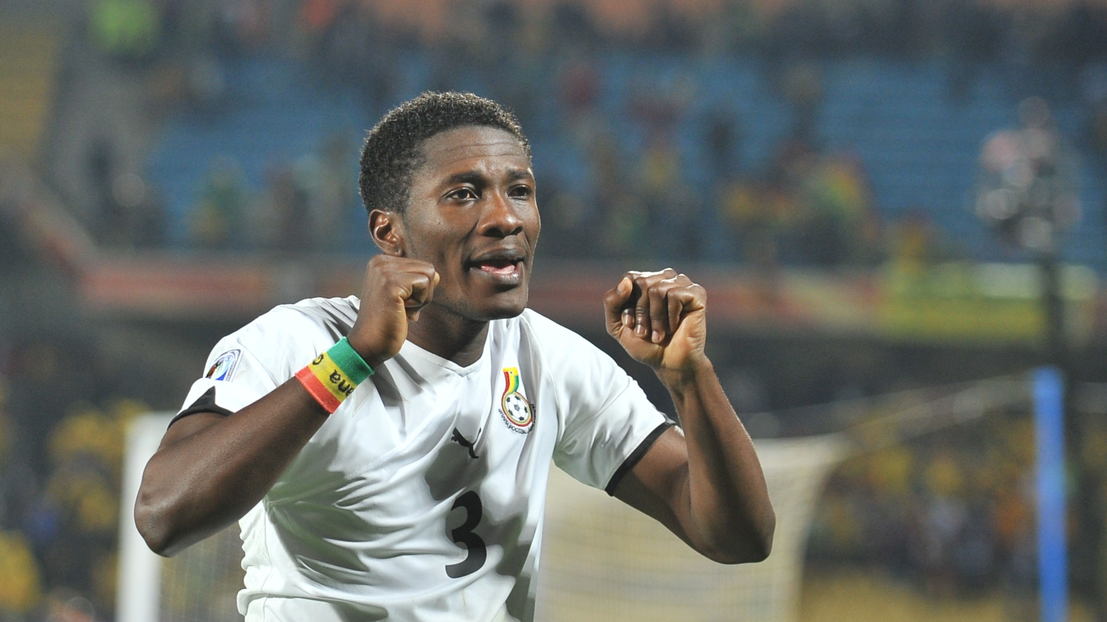 Ghana's striker Asamoah Gyan celebrates