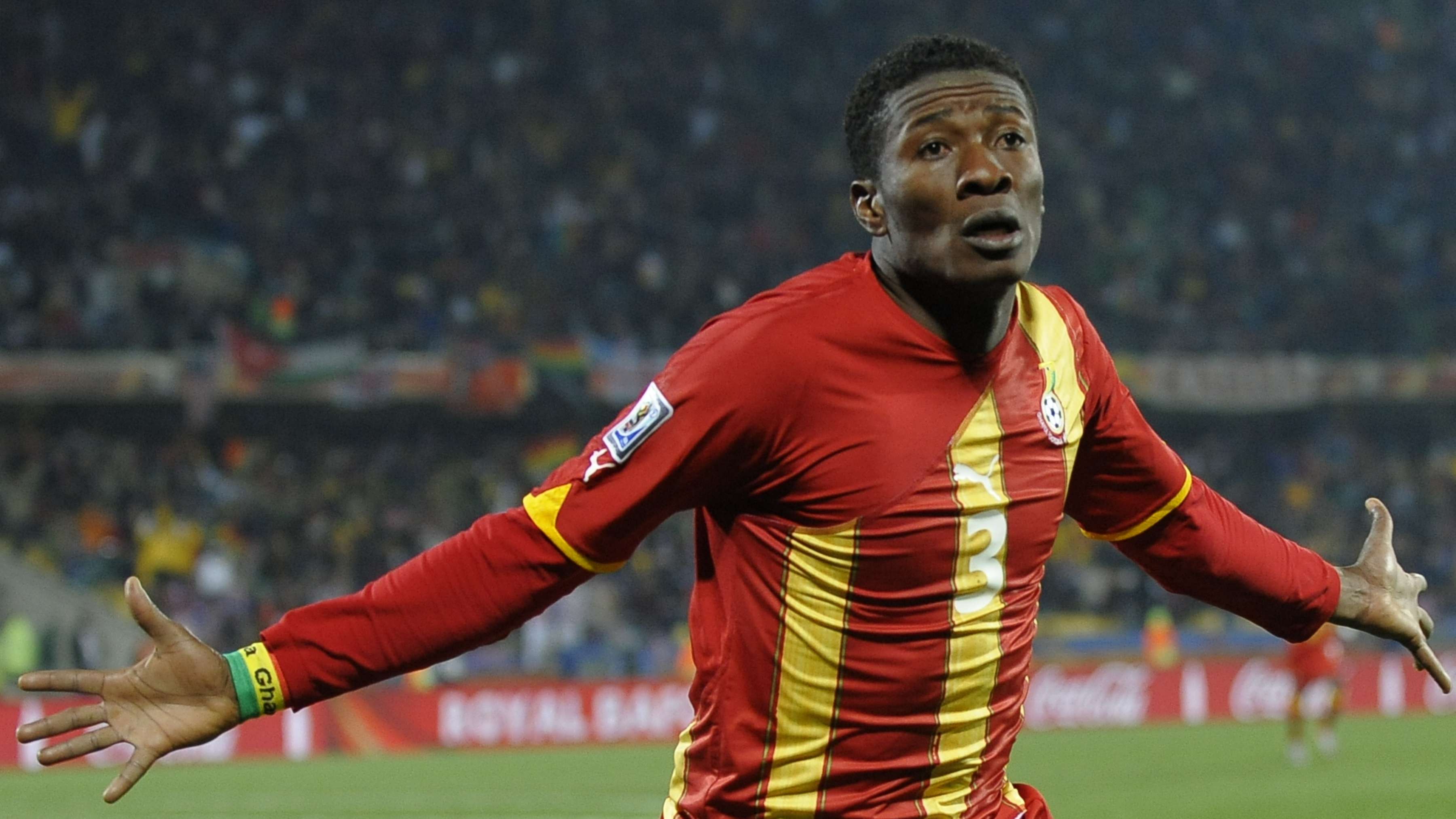 Ghana's striker Asamoah Gyan celebrates