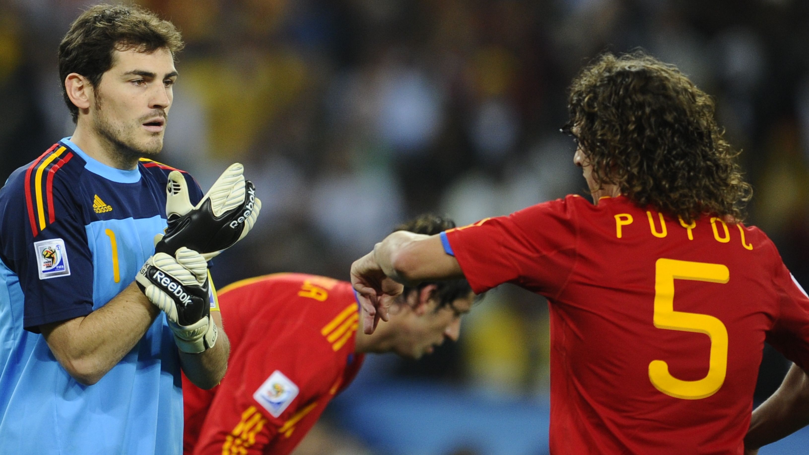 Spain's goalkeeper Iker Casillas (L) and