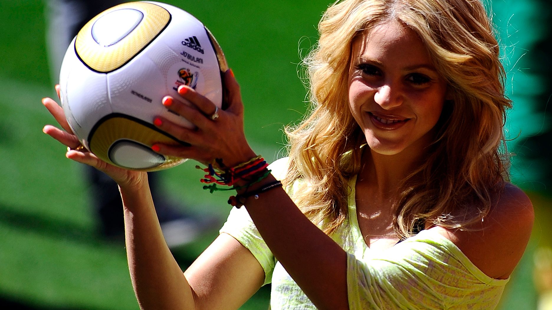 Colombia's singer Shakira, holding the J