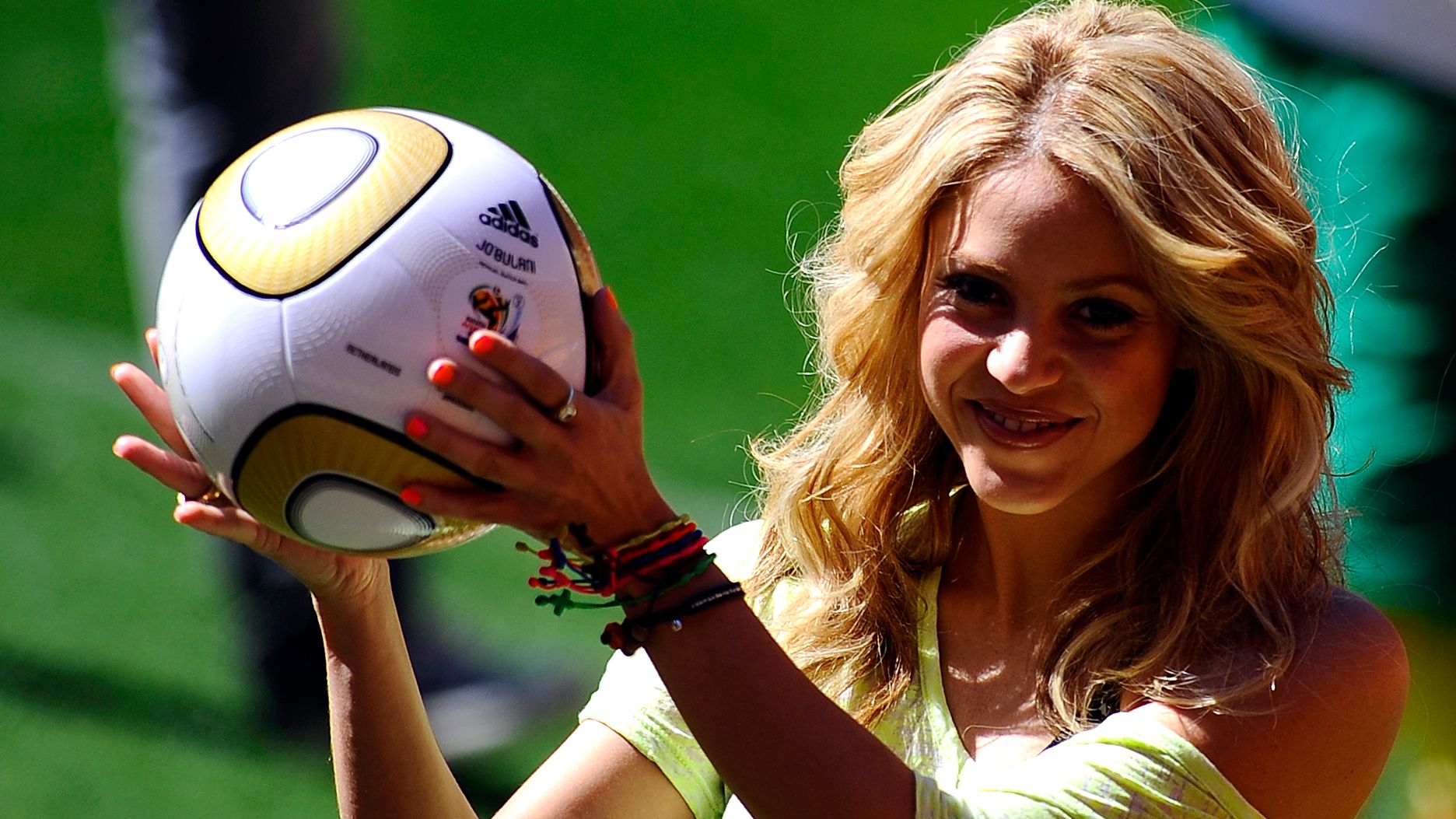 Colombia's singer Shakira, holding the J