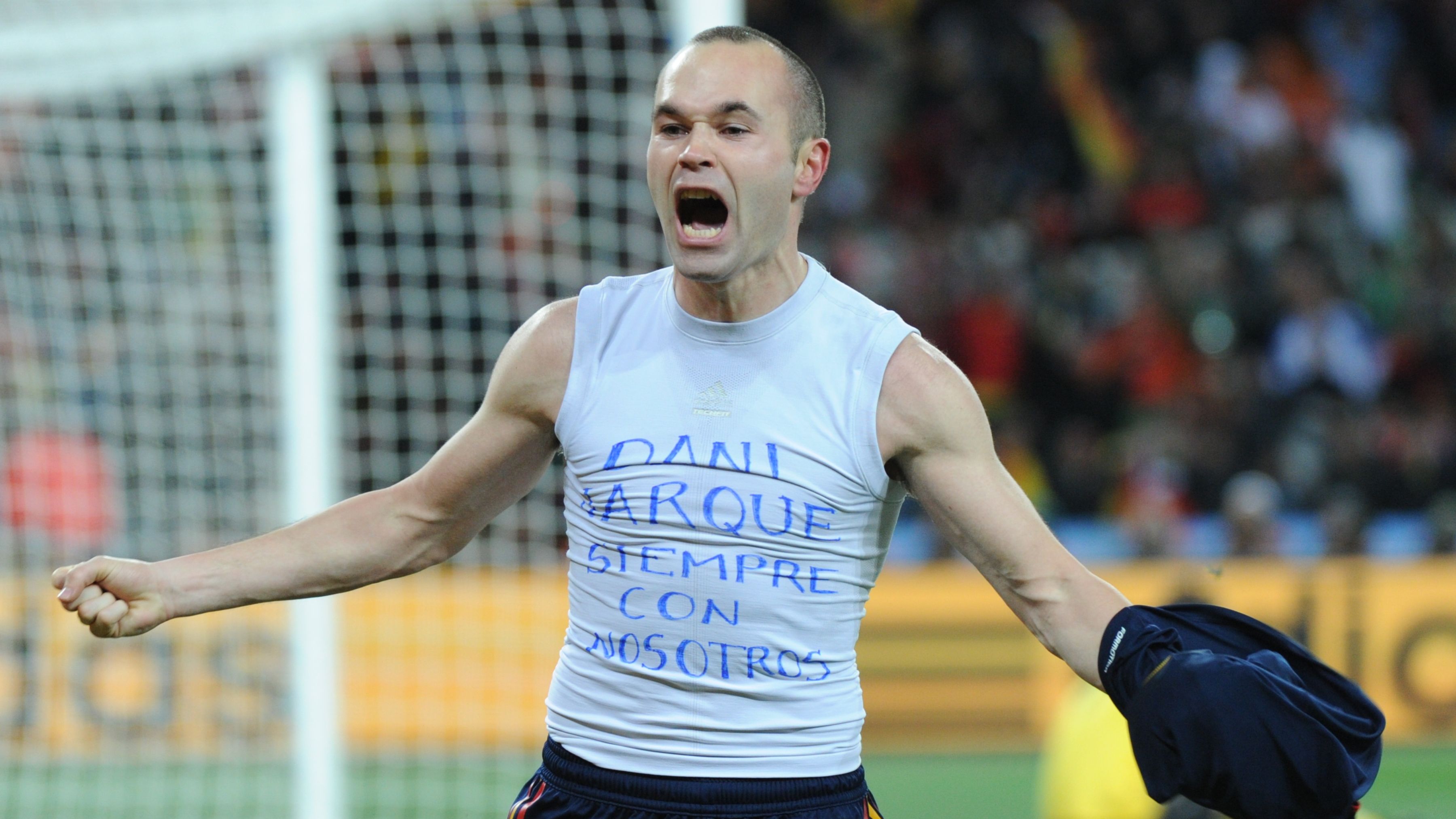 Spain's midfielder Andrés Iniesta celebr