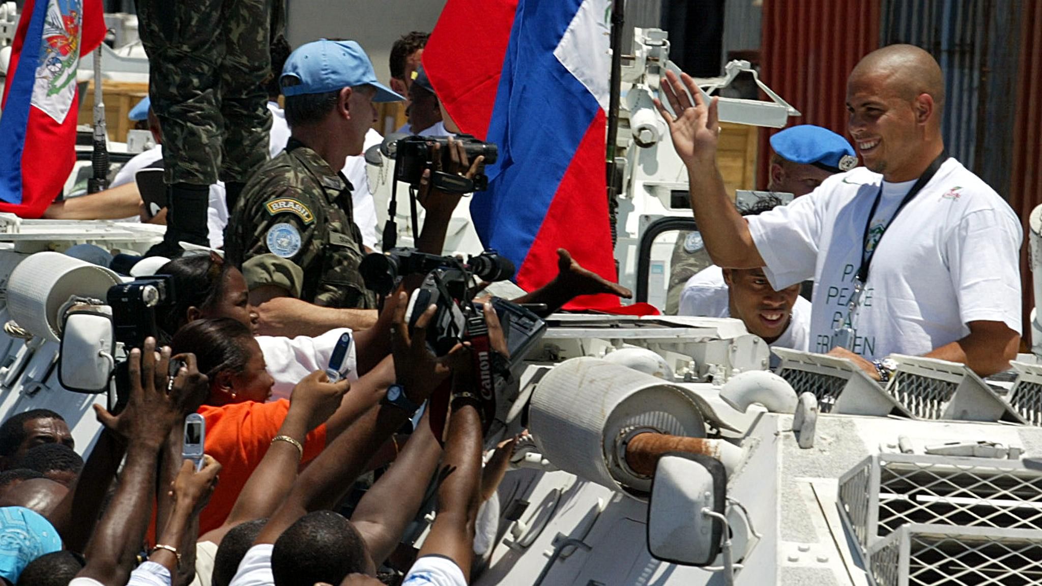 Port-au-Prince soccer fans cheer as Braz