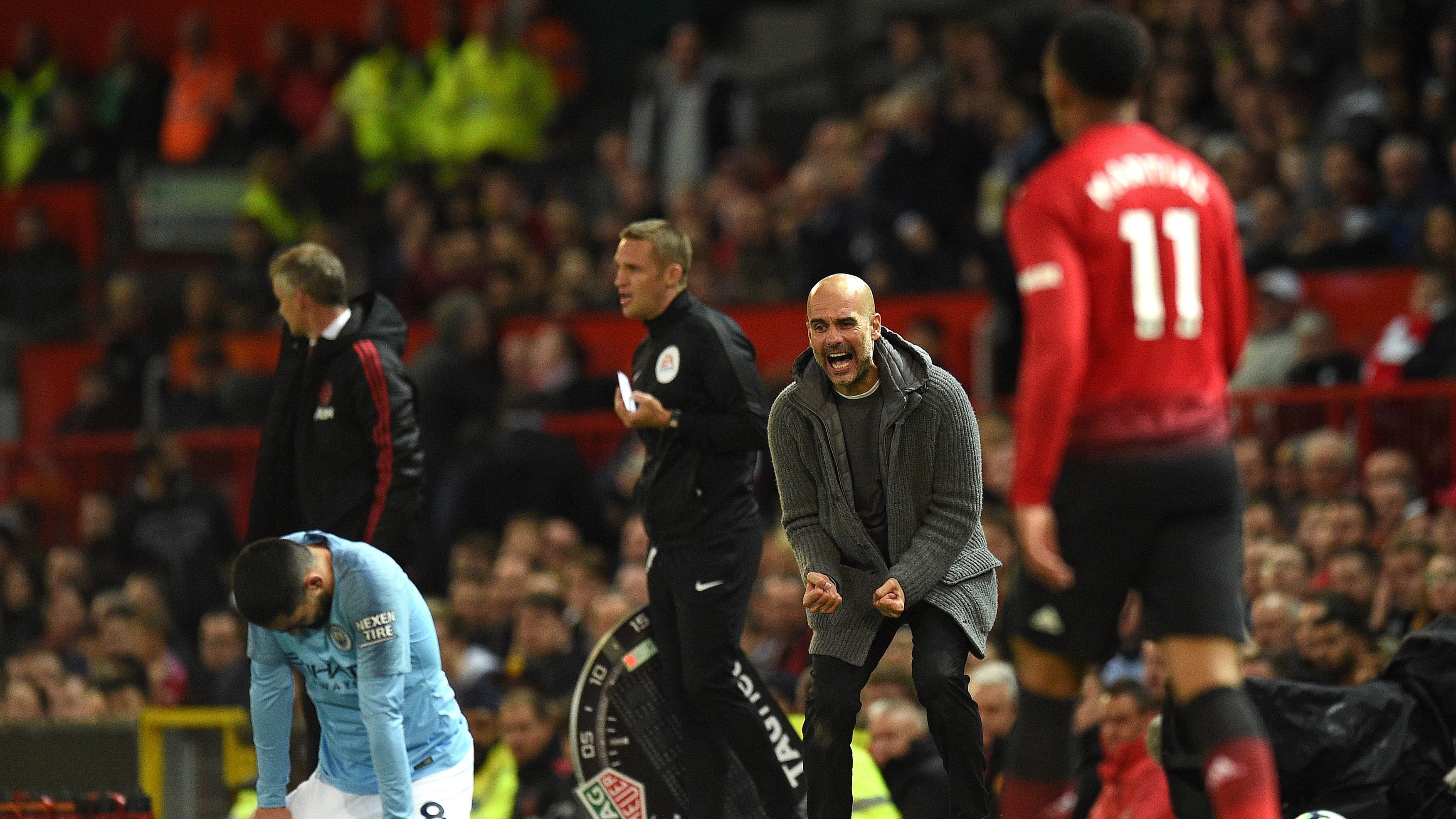 TOPSHOT-FBL-ENG-PR-MAN UTD-MAN CITY