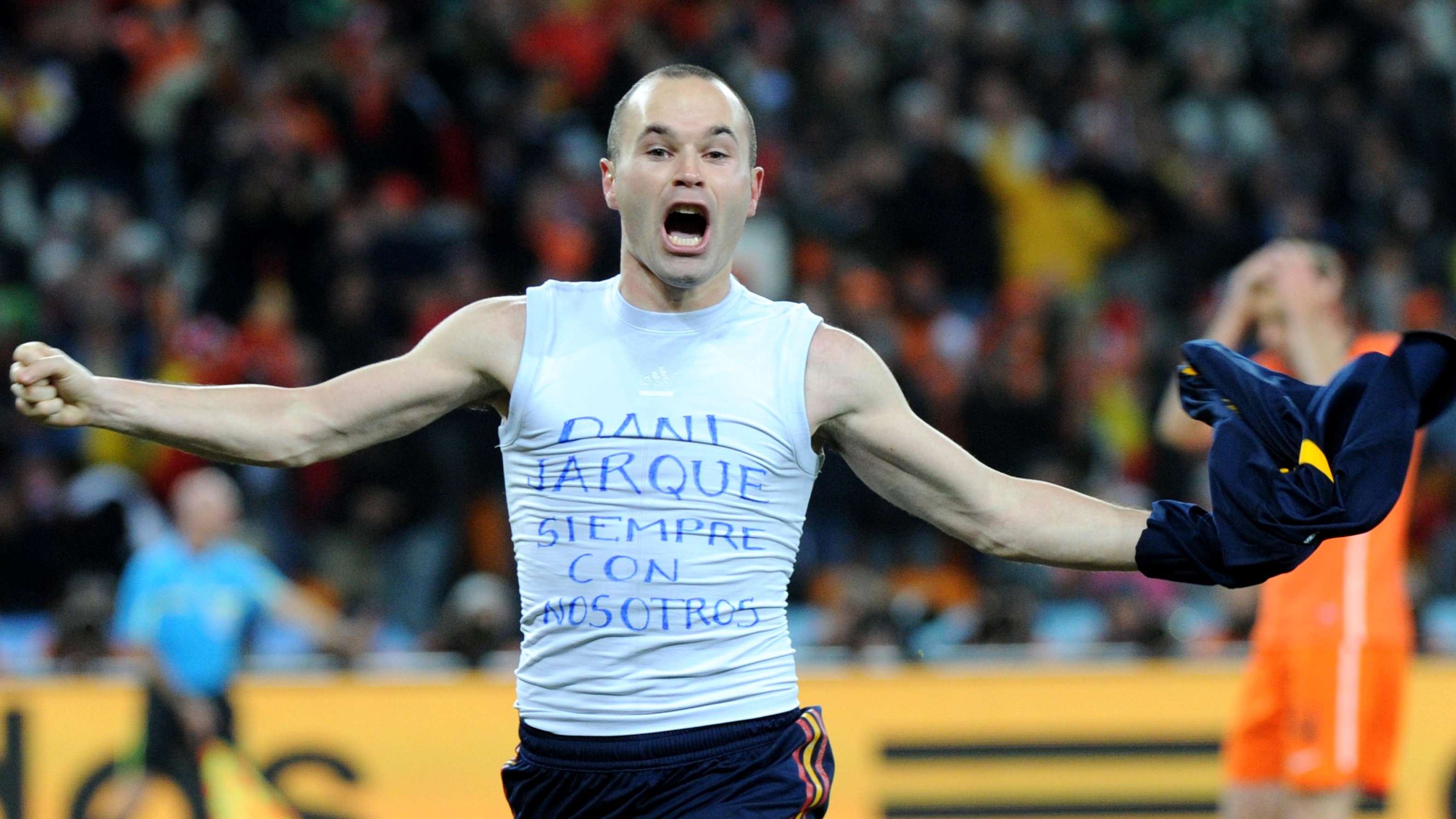 Spain's midfielder Andres Iniesta celebr