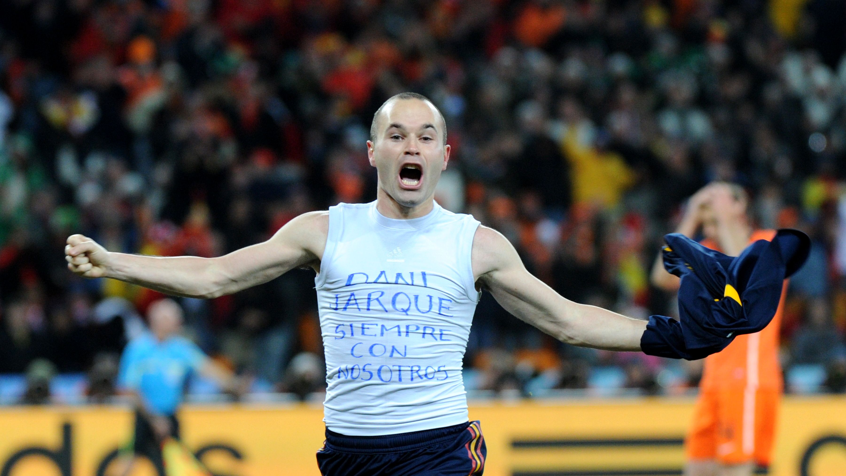 Spain's midfielder Andres Iniesta celebr