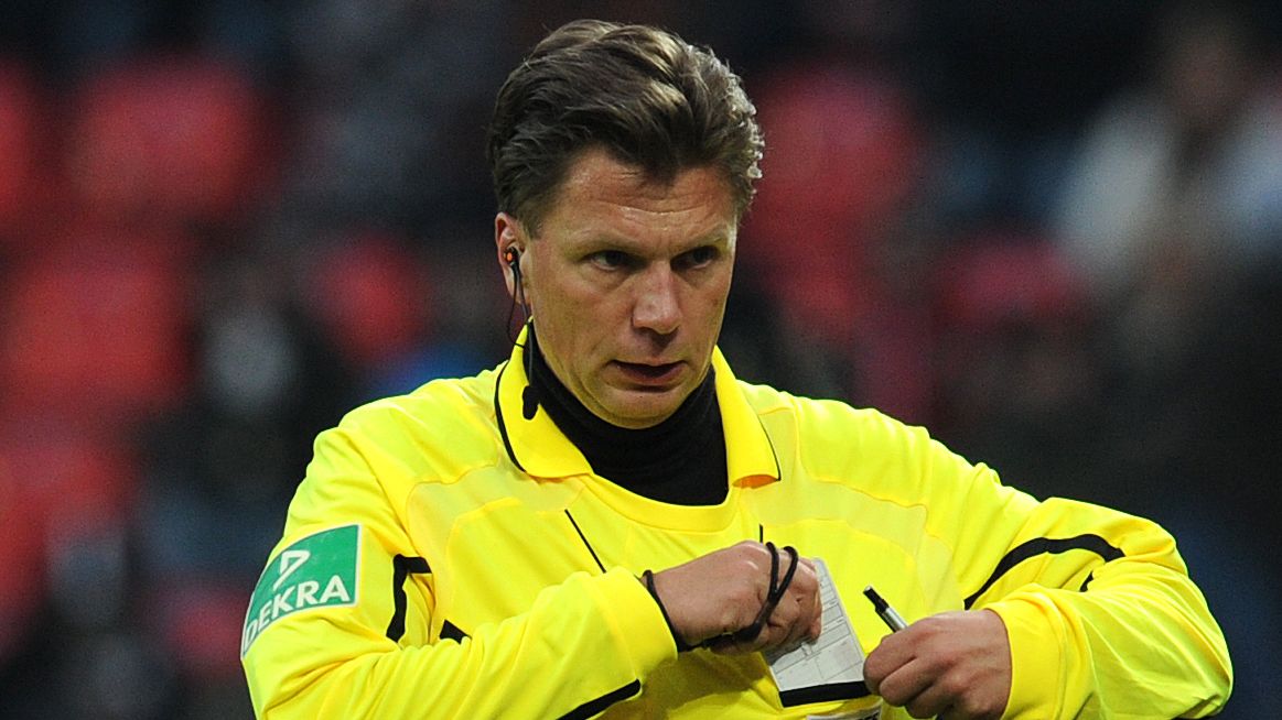Referee Thorsten Kinhoefer reacts during