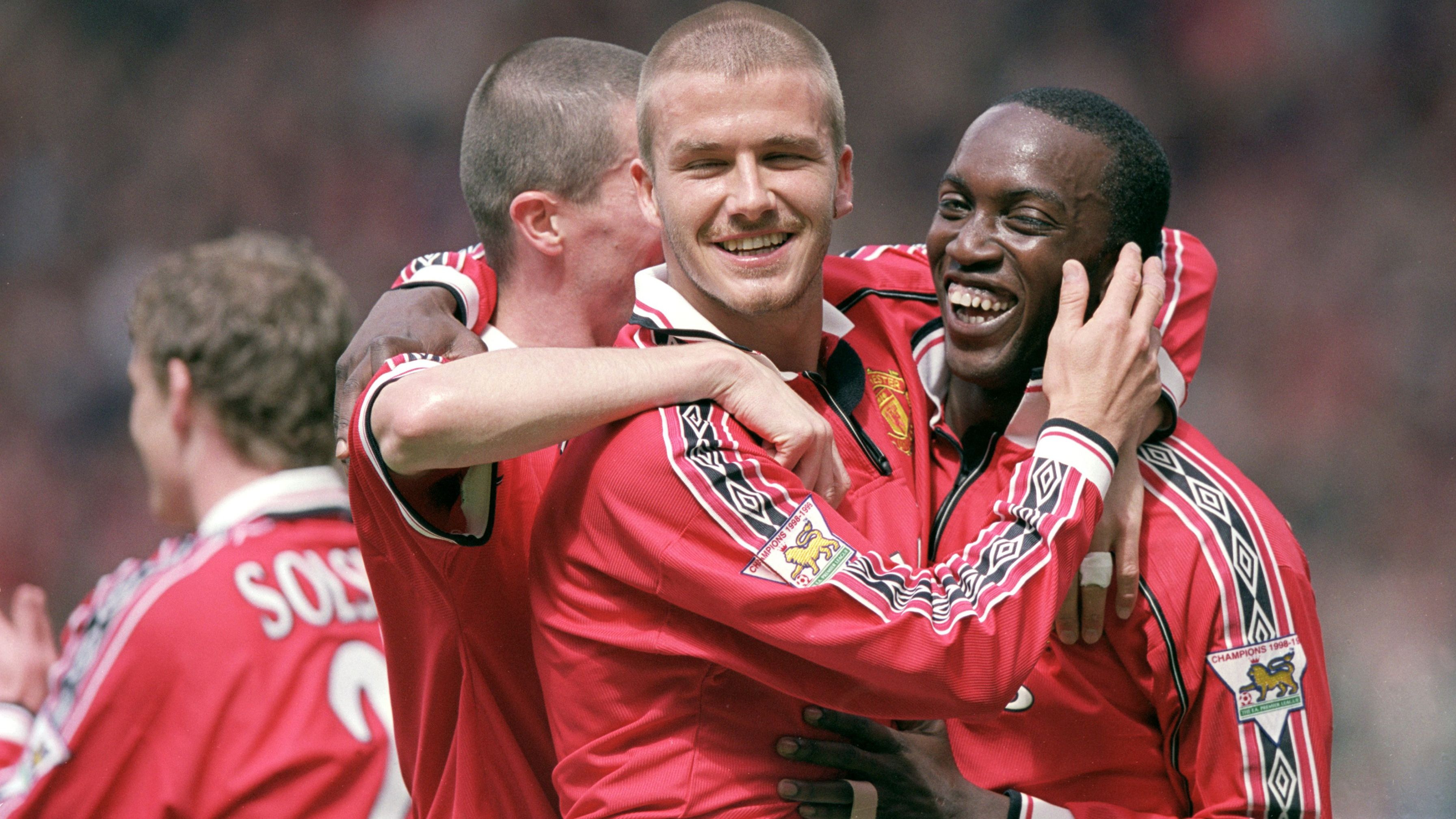 David Beckham Roy Keane and Dwight Yorke of Manchester United celebrate