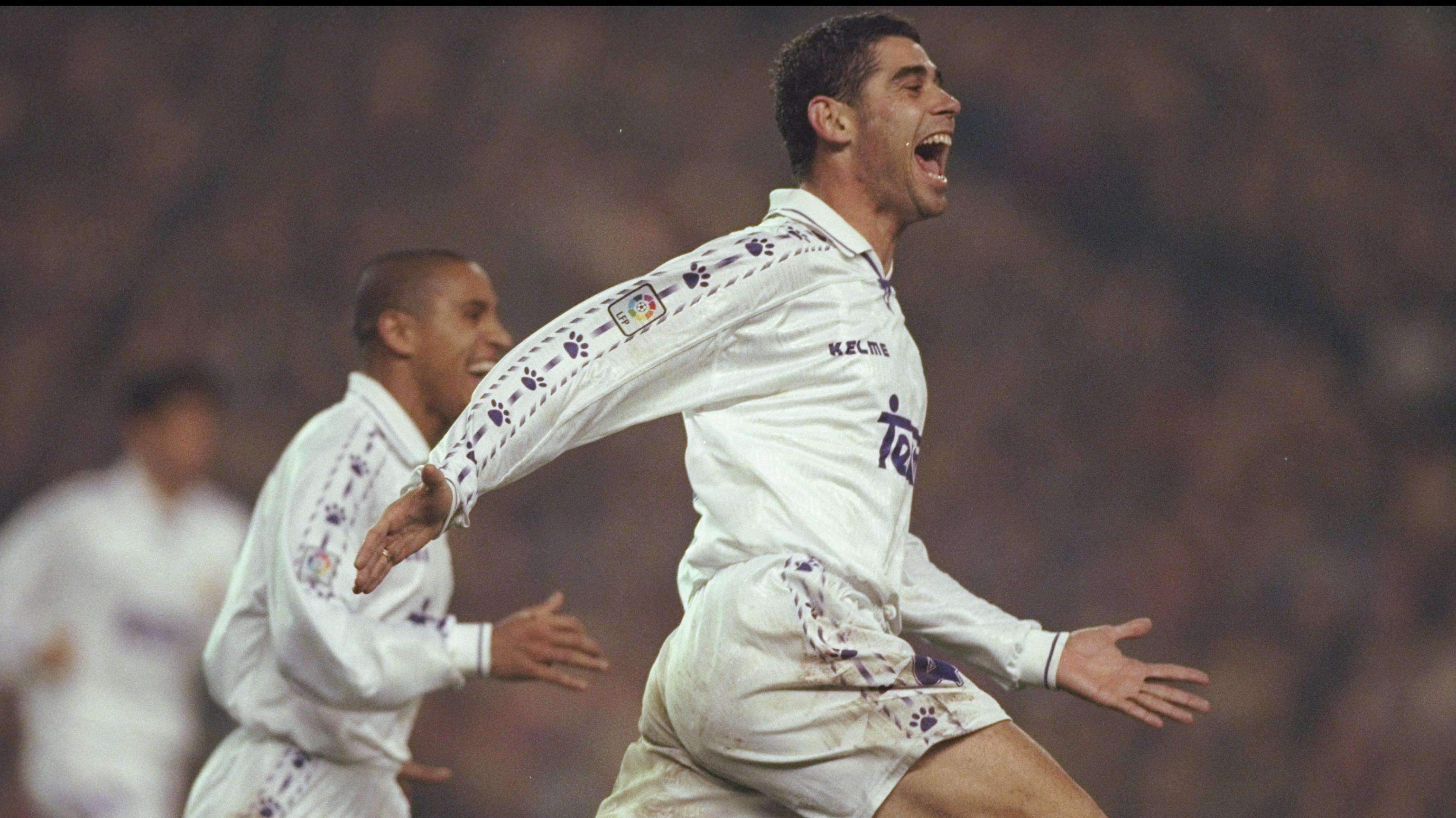 Hierro of Real Madrid celebrates a goal.