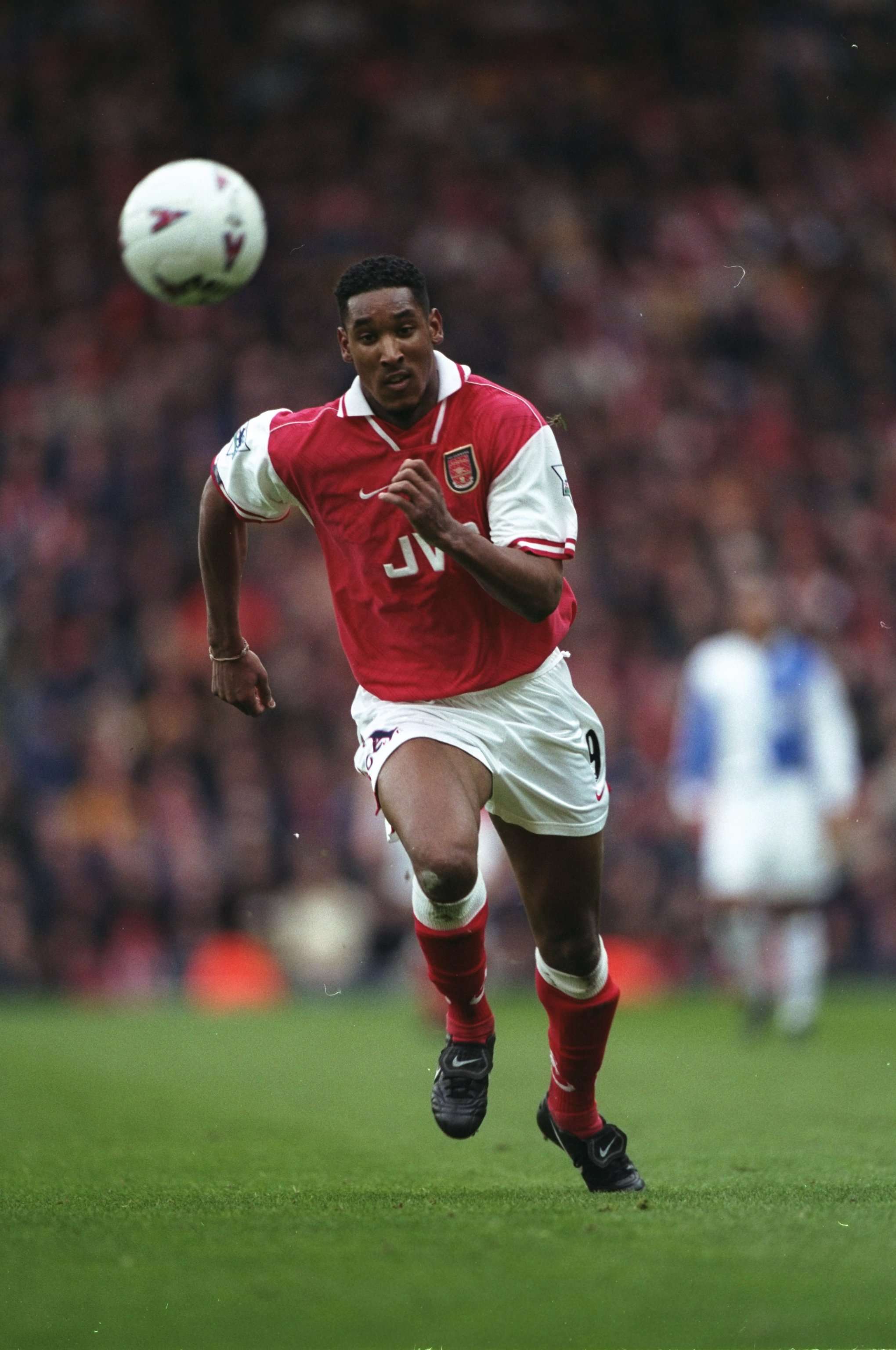 Nikolas Anelka of Arsenal chases the ball