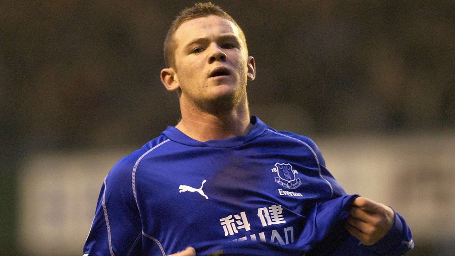 Rooney celebrates scoring