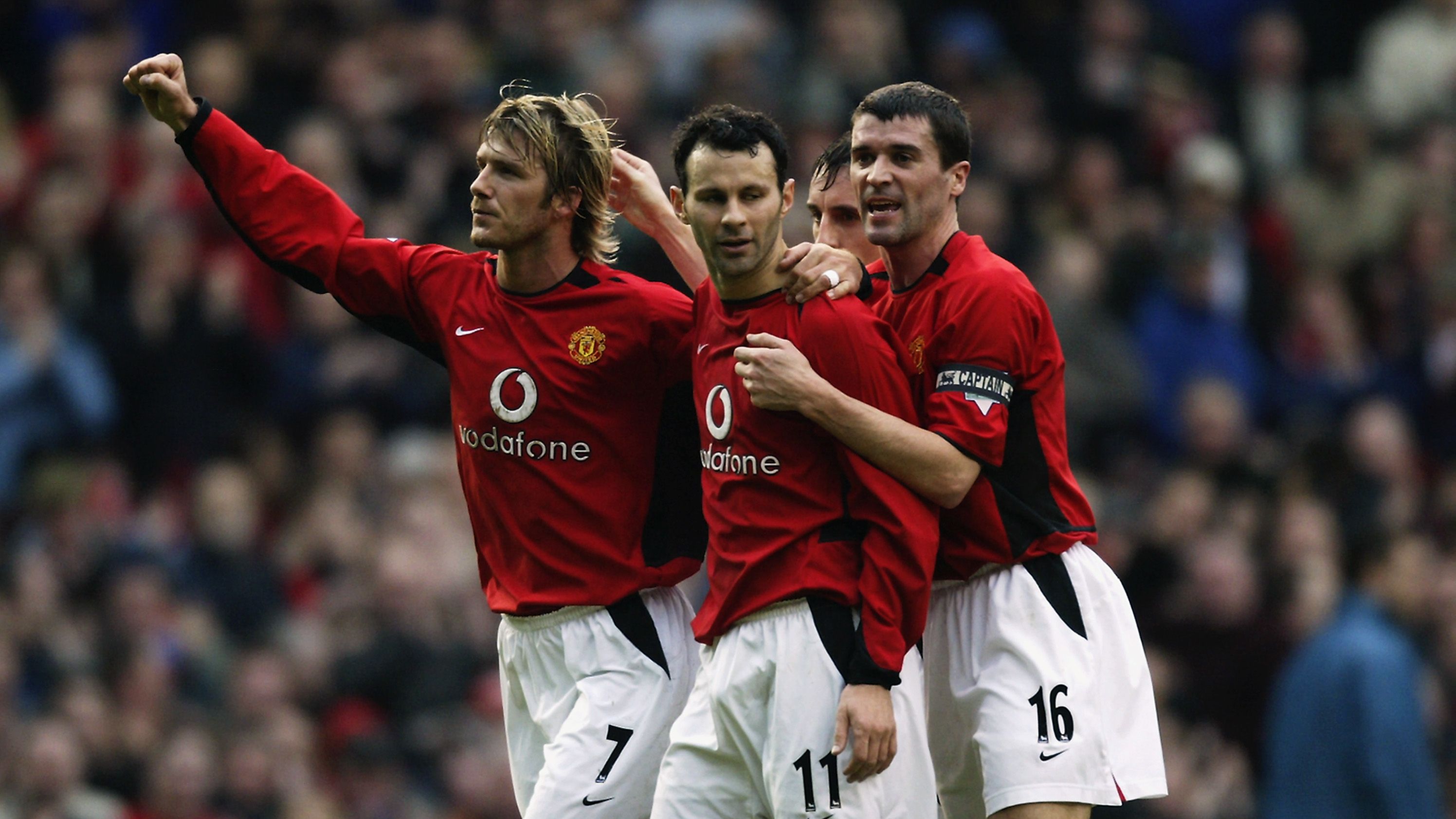 Ryan Giggs of Manchester United celebrates his goal with team-mates David Beckham and Roy Keane