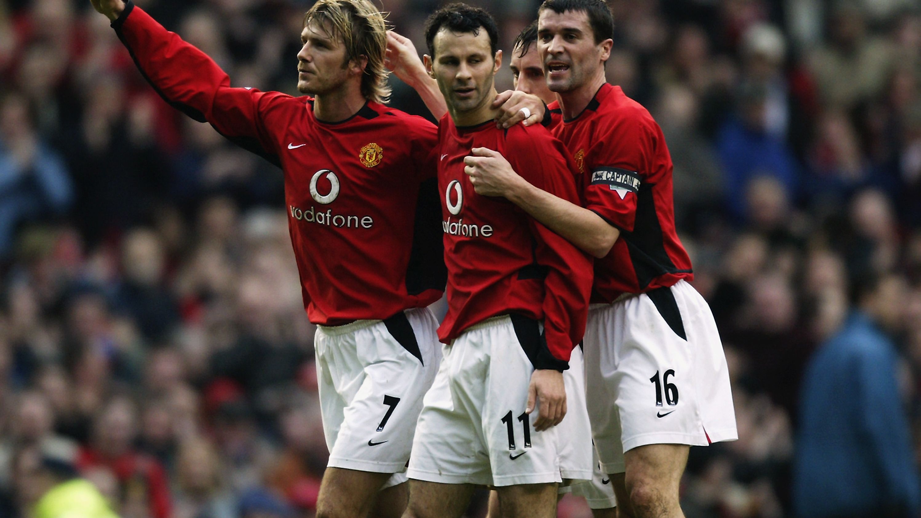 Ryan Giggs of Manchester United celebrates his goal with team-mates David Beckham and Roy Keane