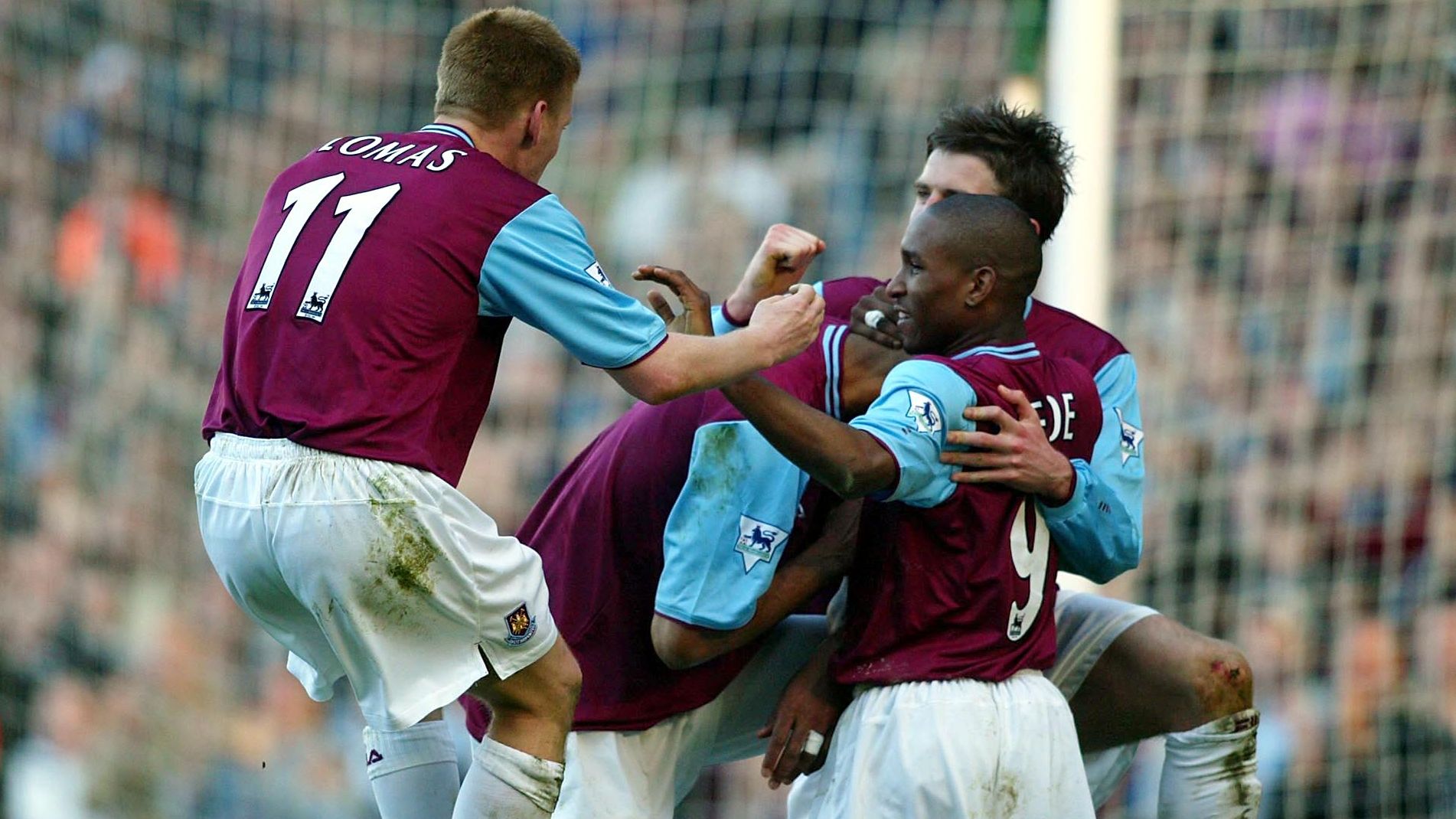 Frederic Kanoute of West Ham is congratulaed