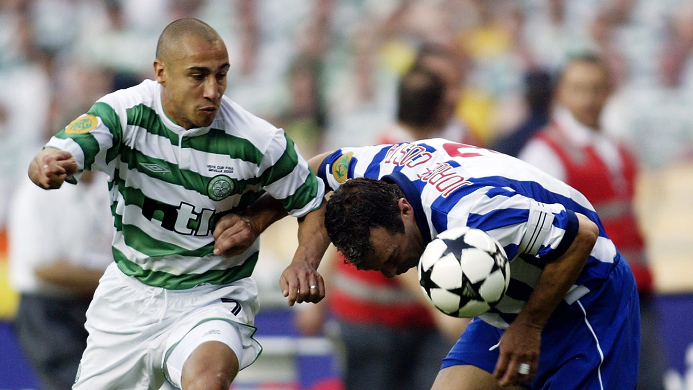 Jorge Costa of FC Porto and Henrik Larsson of Celtic
