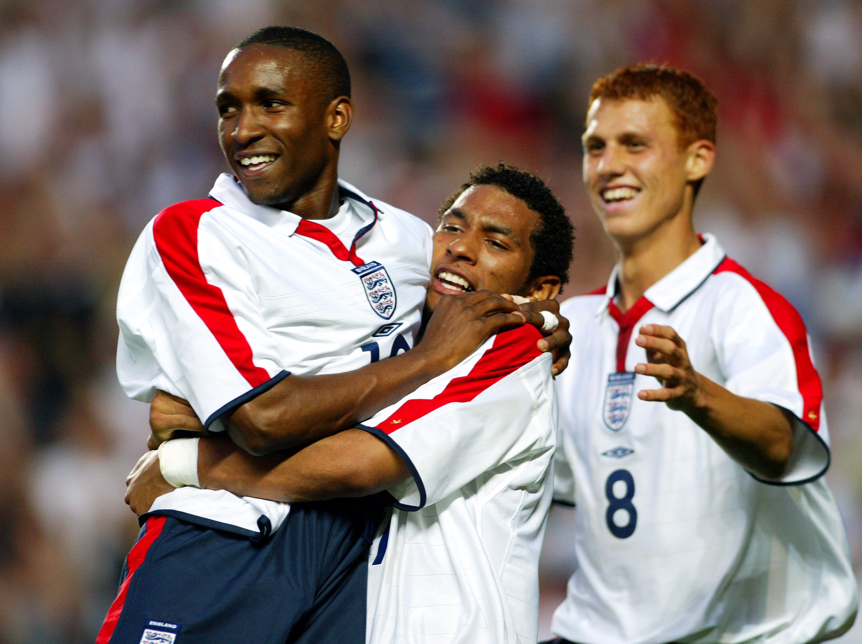 Jermaine Pennant, Steven Sidwell and Jermain Defoe of England celebrate