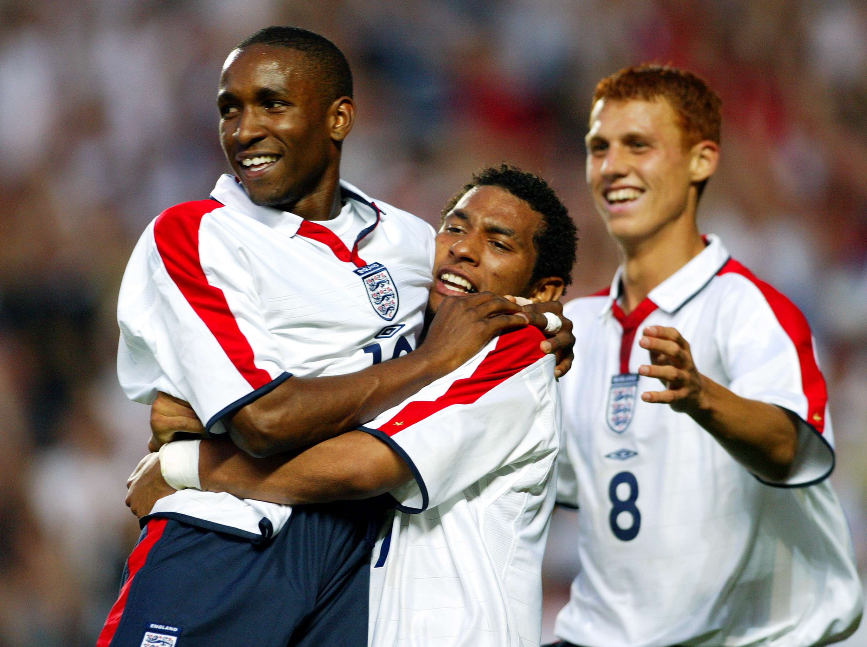 Jermaine Pennant, Steven Sidwell and Jermain Defoe of England celebrate