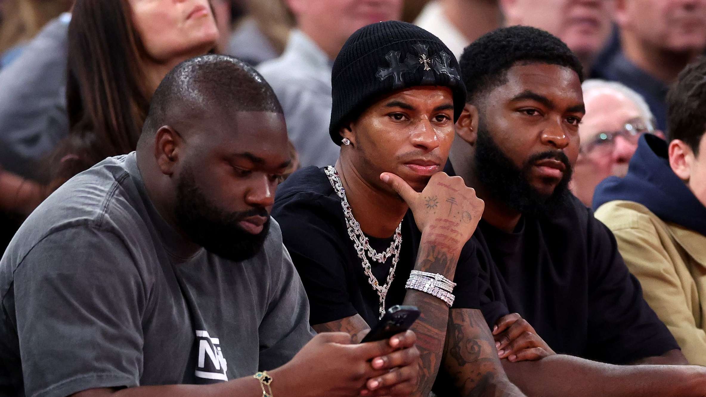Marcus Rashford labelled a 'clown' after being spotted courtside at New York Knicks NBA Cup game alongside Tom Brady as attacker takes break from Man Utd having been left out of latest