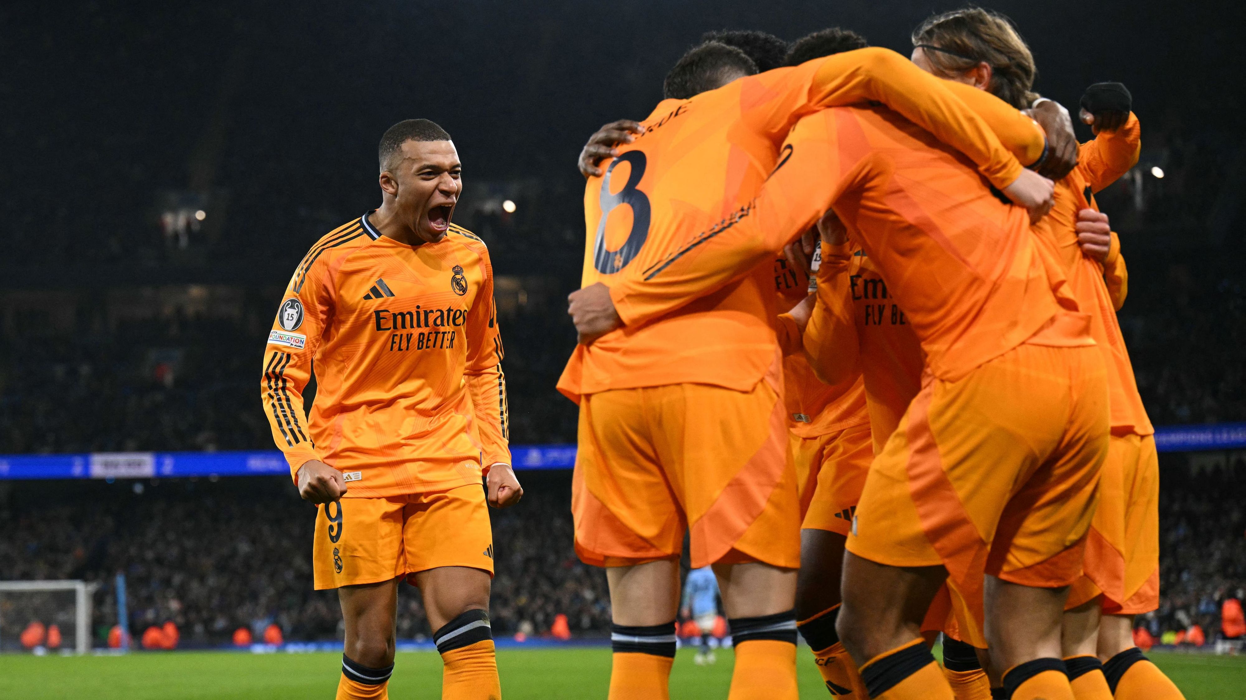 TOPSHOT-FBL-EUR-C1-MAN CITY-REAL MADRID