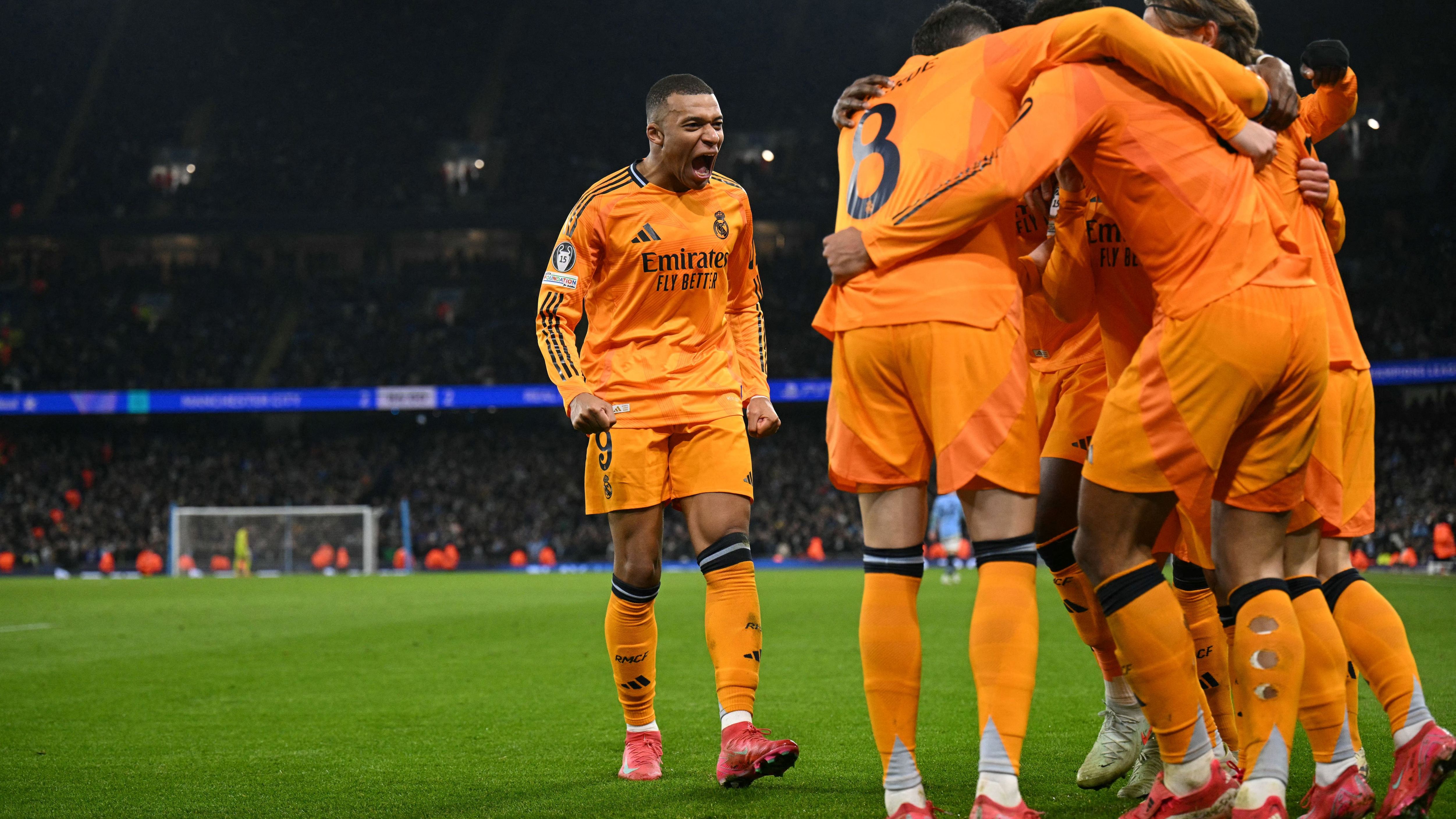 TOPSHOT-FBL-EUR-C1-MAN CITY-REAL MADRID