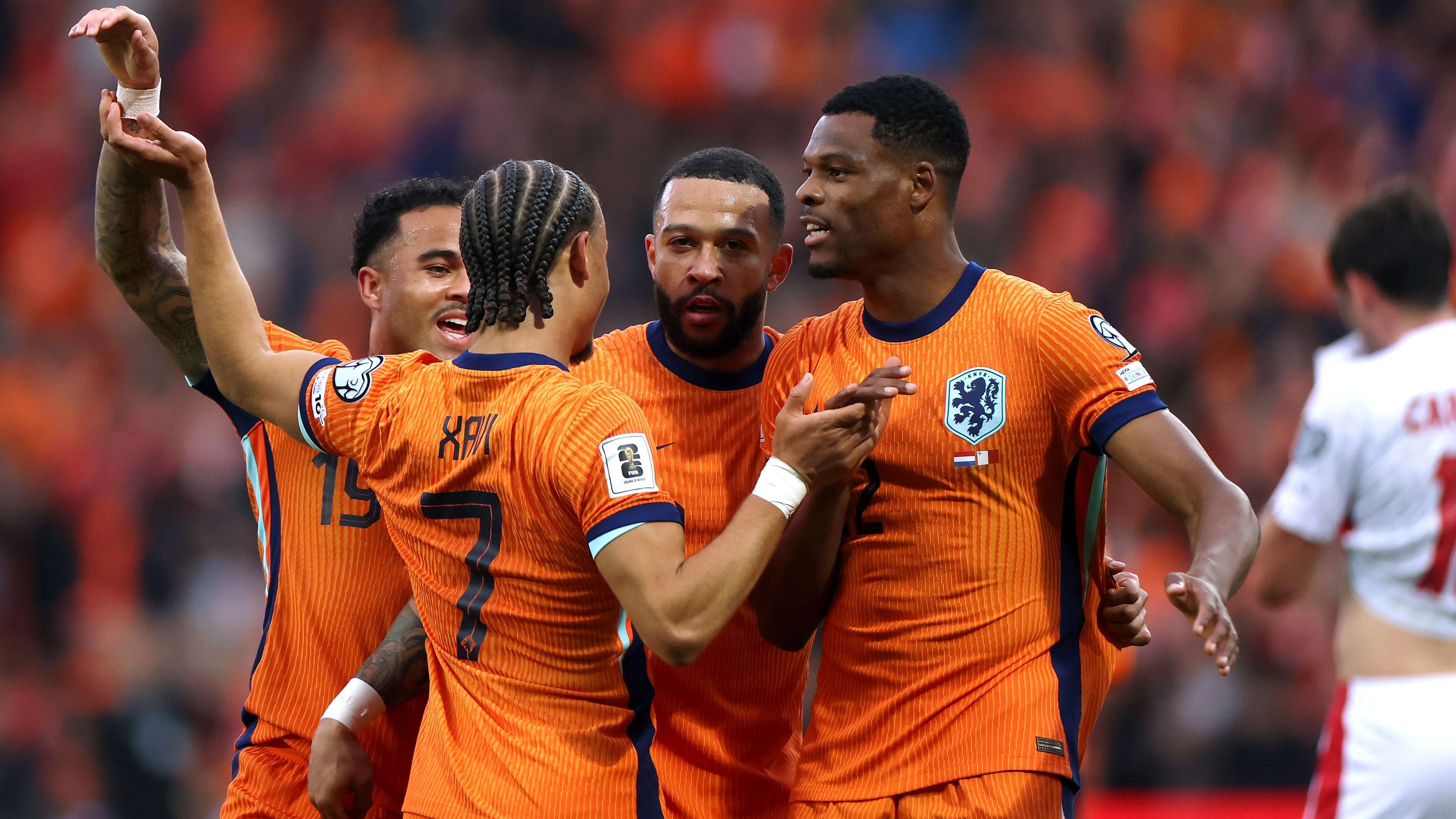 Netherlands national football team celebrating in orange jerseys