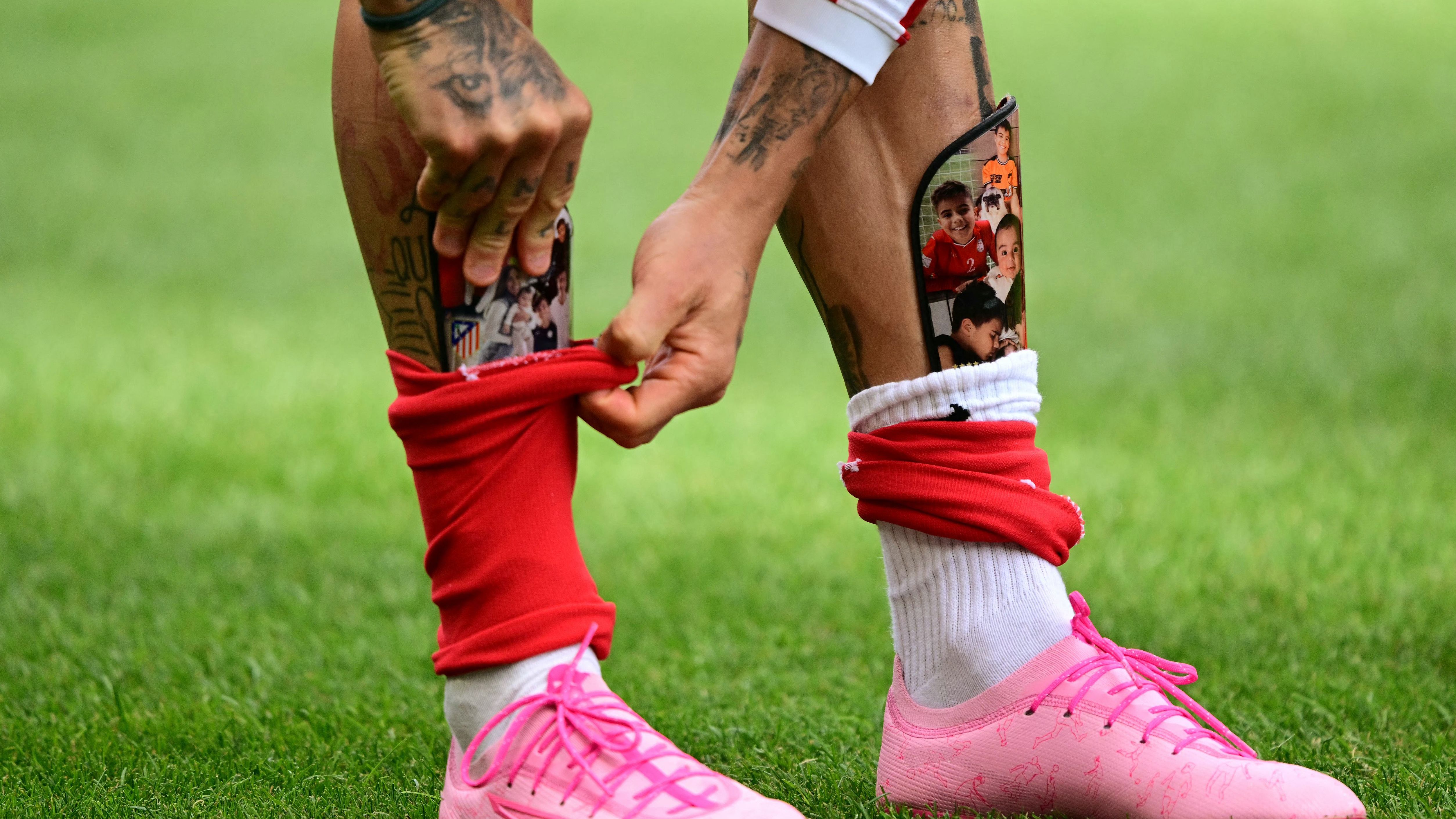 Why do professional footballers wear mini shin pads? Reasons for small leg guards in soccer explained | Goal.com UK