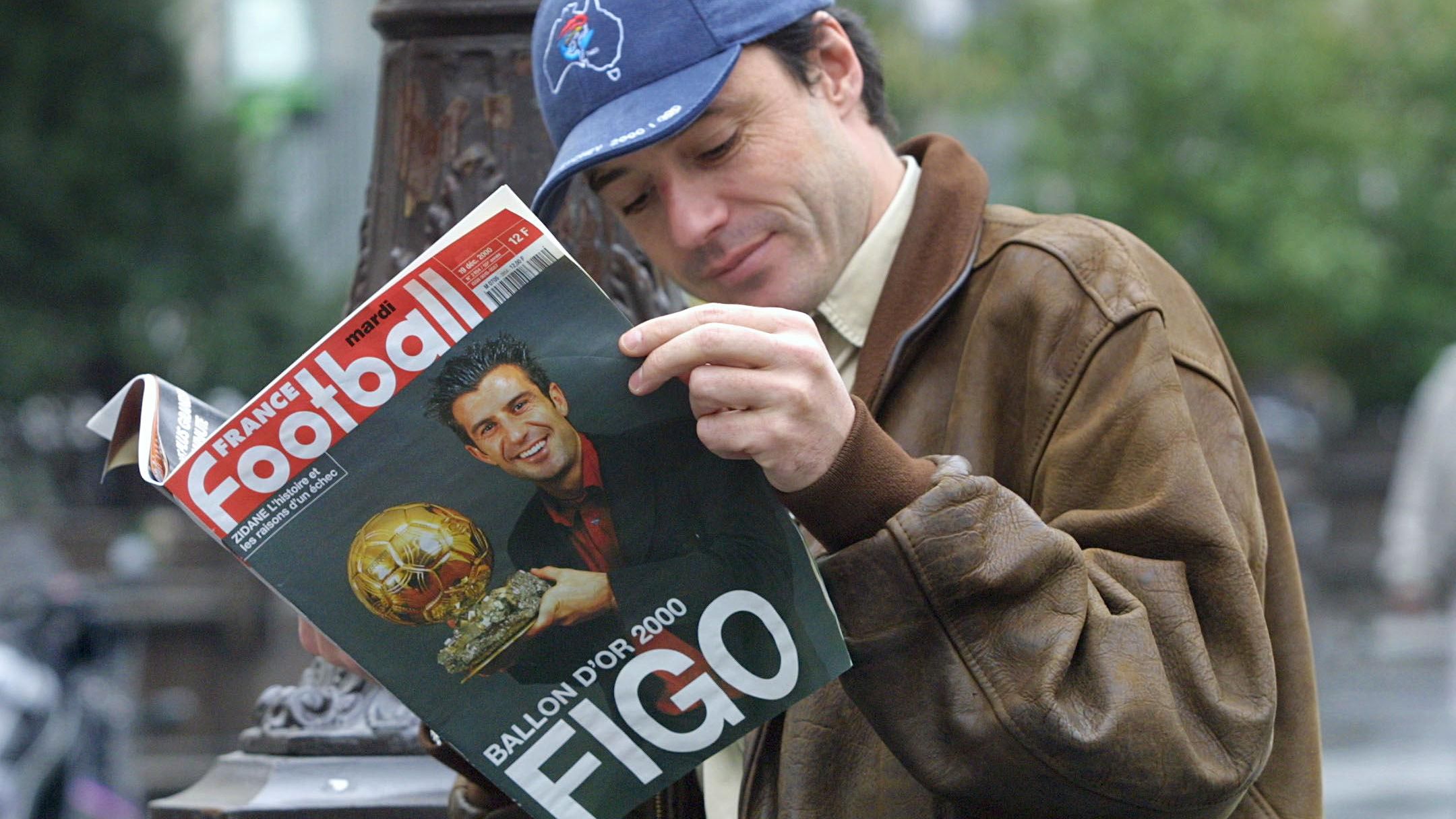 A resident reads the last edition of the French Fr