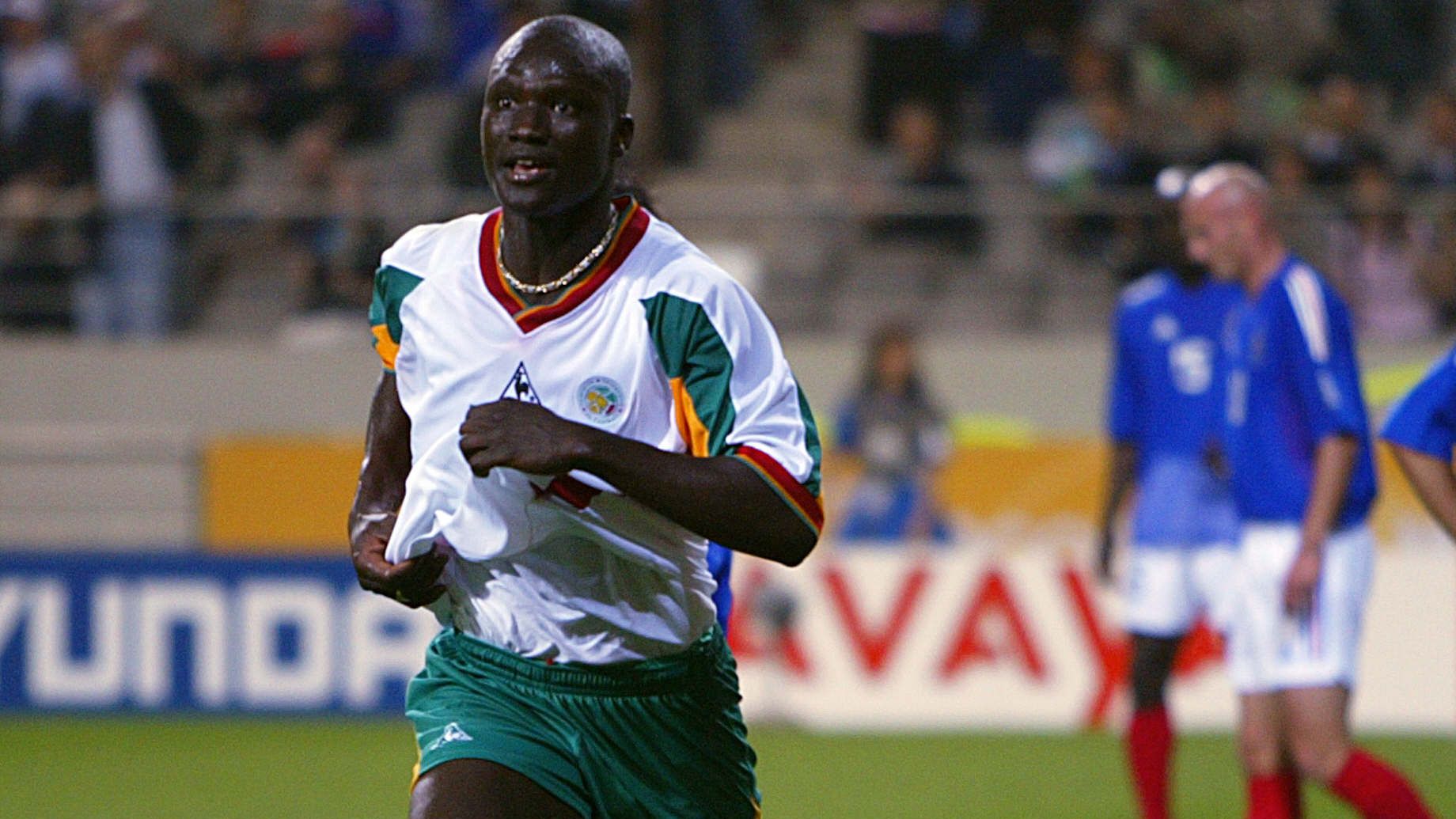 Senegalese midfielder Pape Bouba Diop (L) celebrat