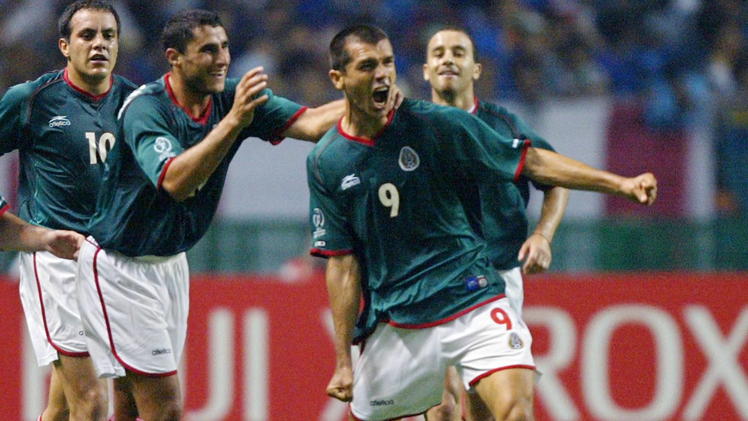 Mexico's forward Jared Borgetti (R) celebrates wit