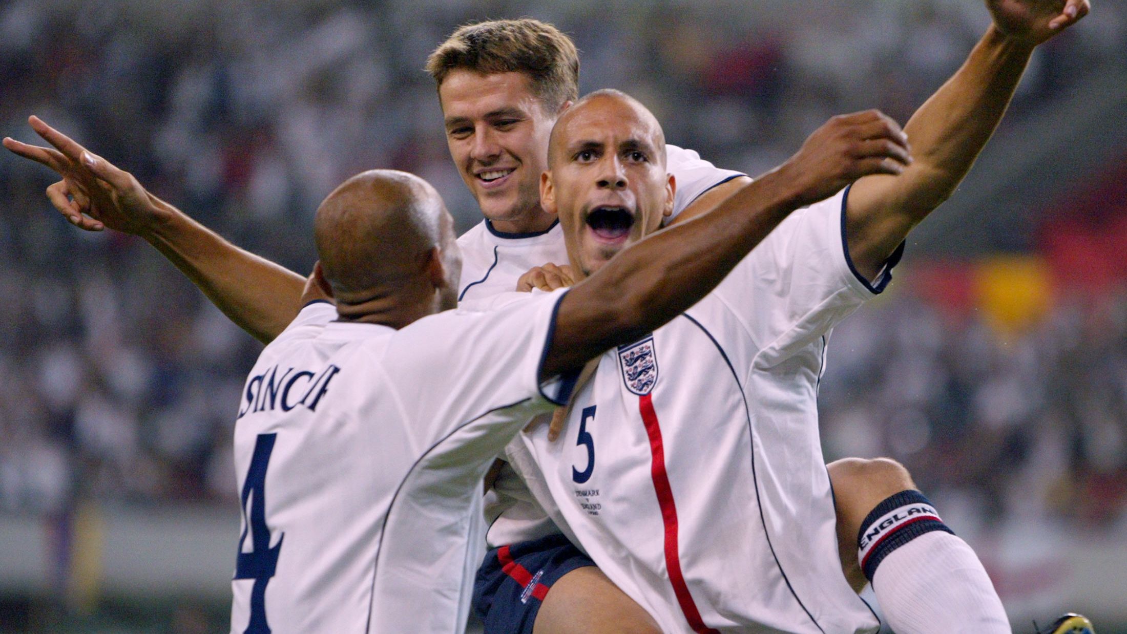 English players defender Trevor Sinclair (L) and f