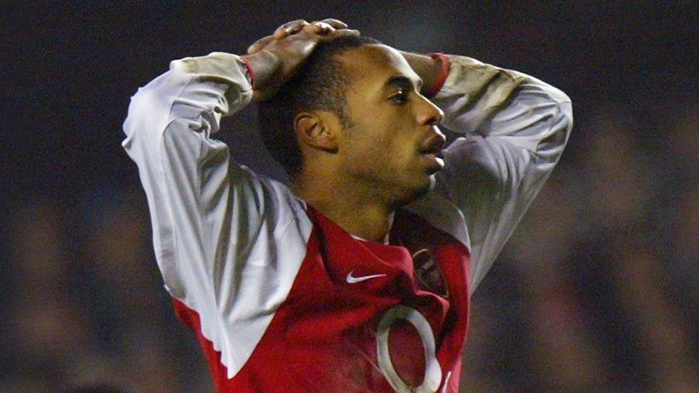Arsenal's French striker Thierry Henry reacts afte