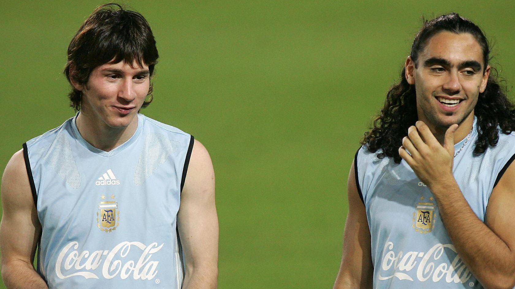 Argentinian players Lionel Messi (L) and