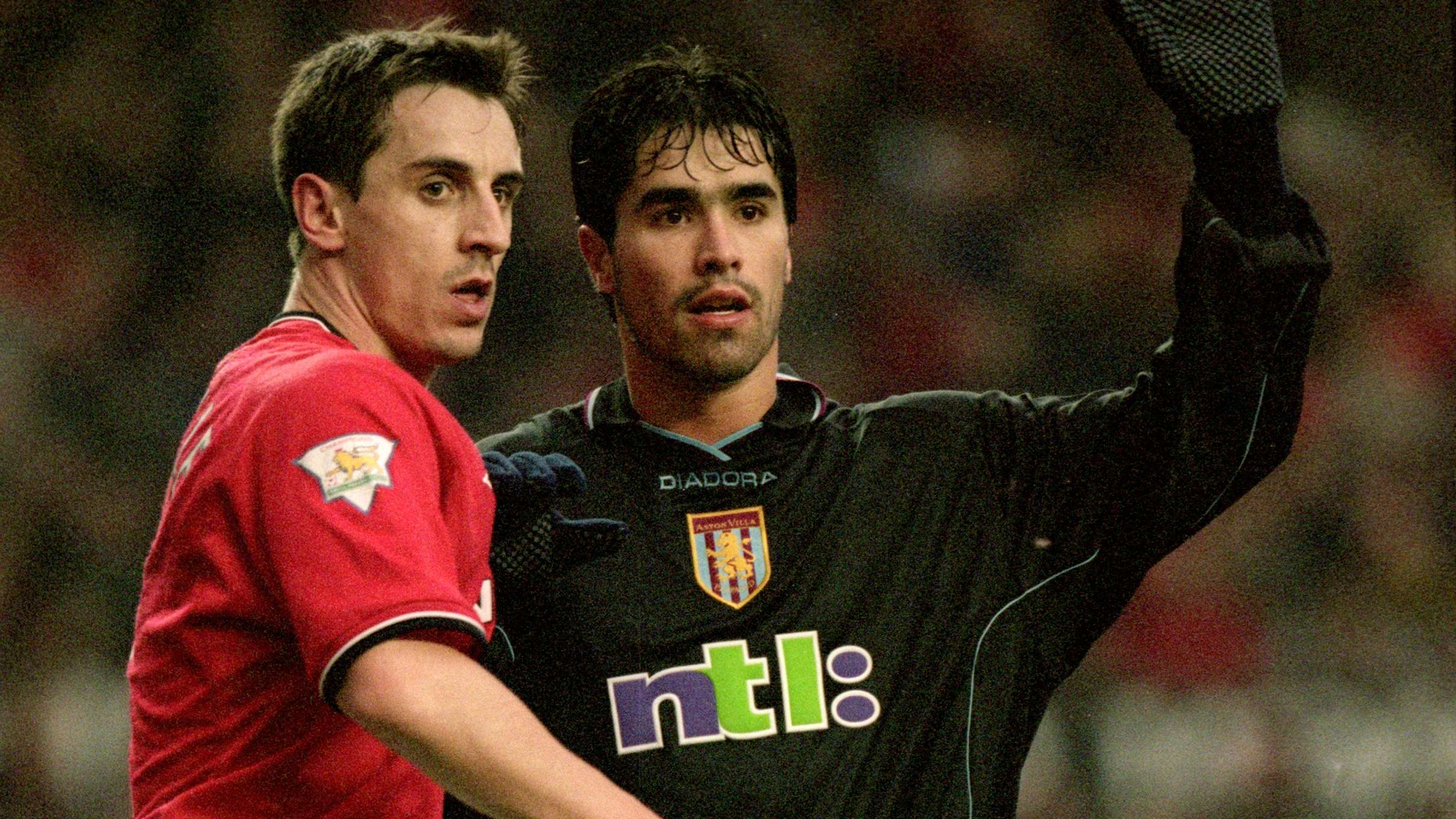 Gary Neville and Juan Pablo Angel