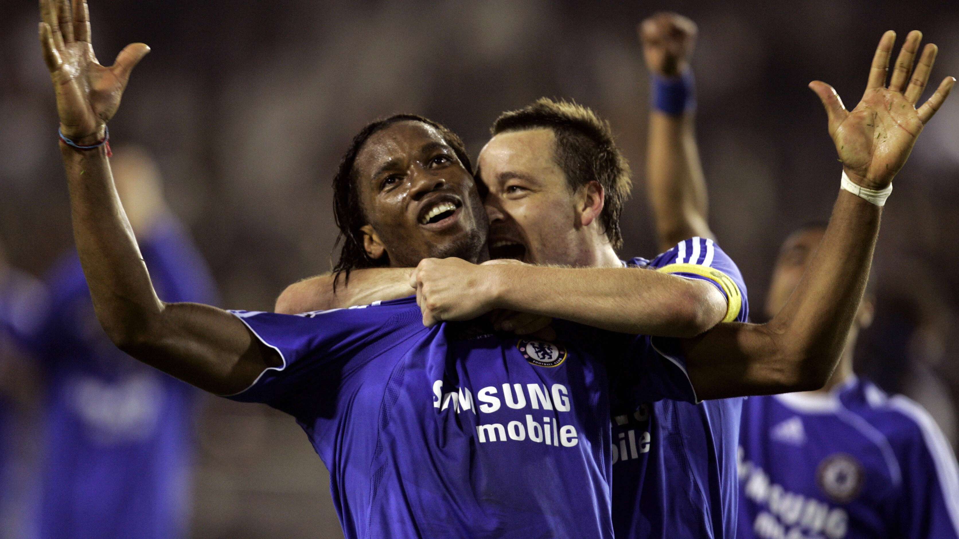 Chelsea's Dider Drogba and captain John...