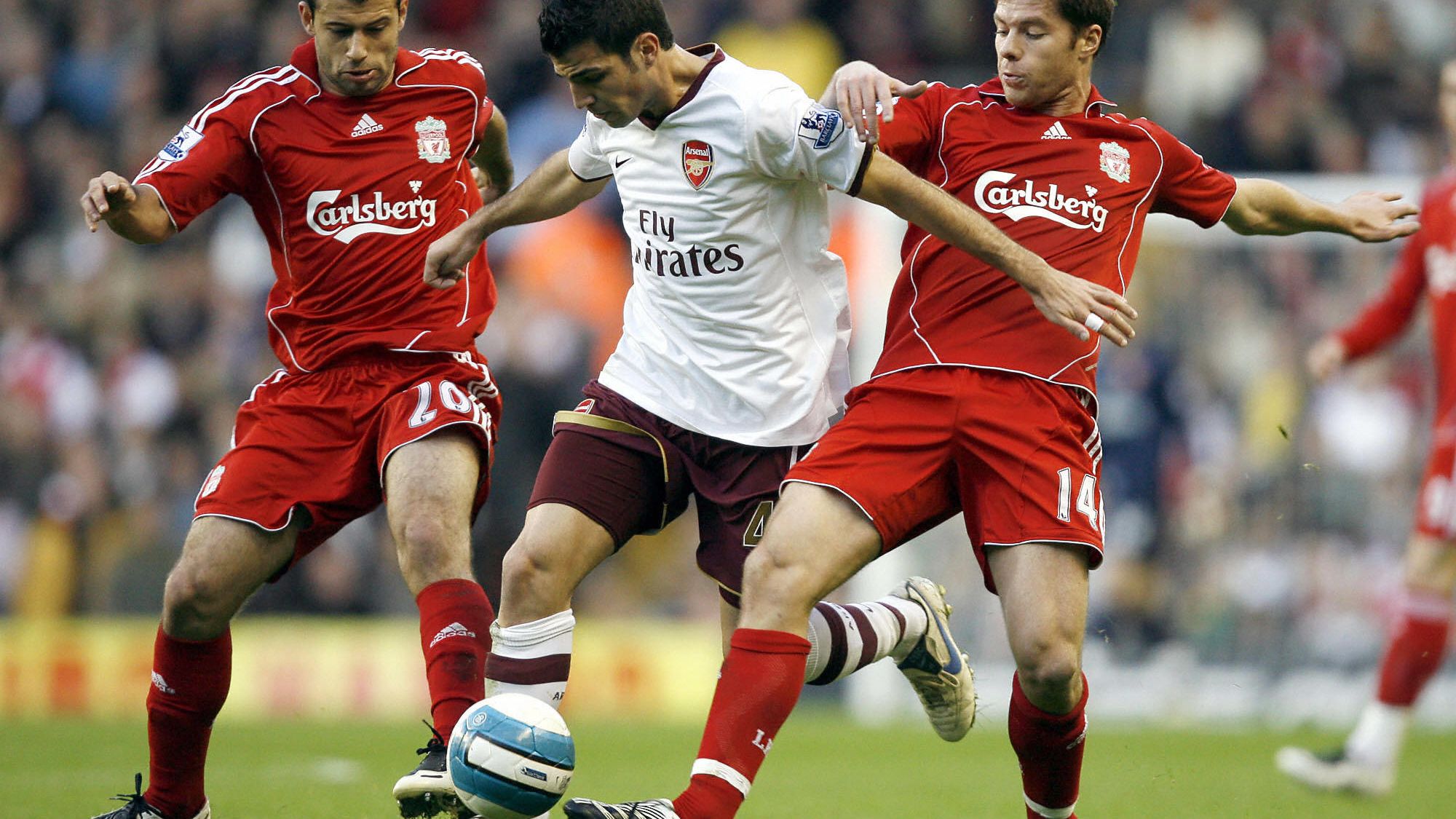 Javier Mascherano (L) and Xabi Alonso (R
