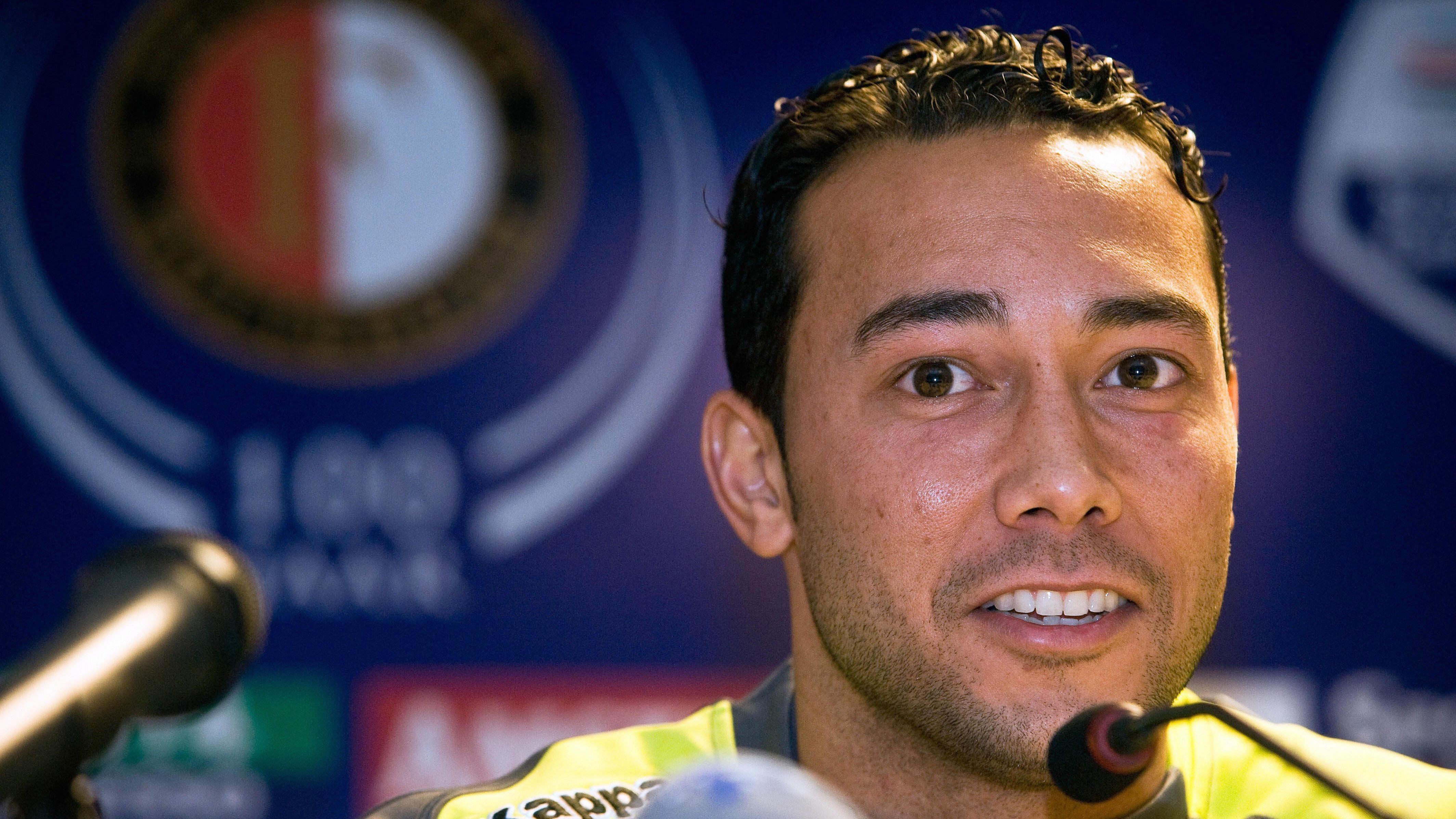 Denny Landzaat speaks during a press con